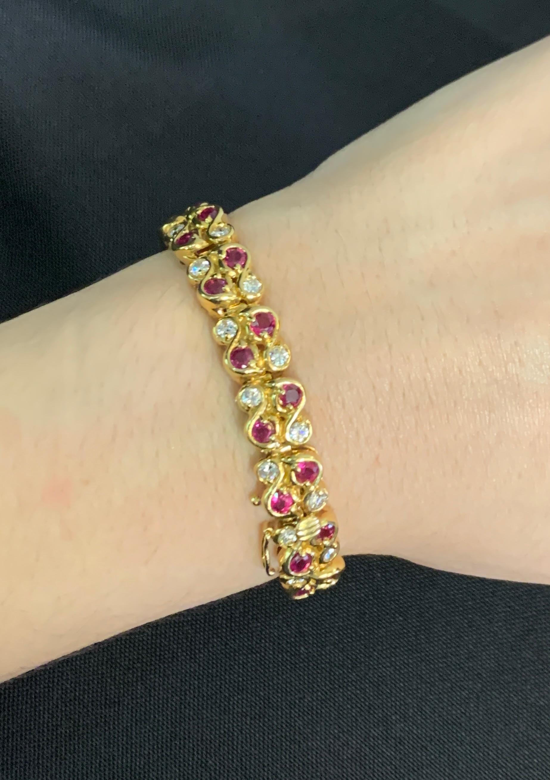 Ruby and Diamond Bracelet

Yellow gold bracelet with 34 round diamonds and 34 rubies. 

Approximate Diamond Weight: 2.85 carats
Approximate Ruby Weight: 5.55 carats

Metal Type: 18 Karat Gold 
Approximately Measures: 7