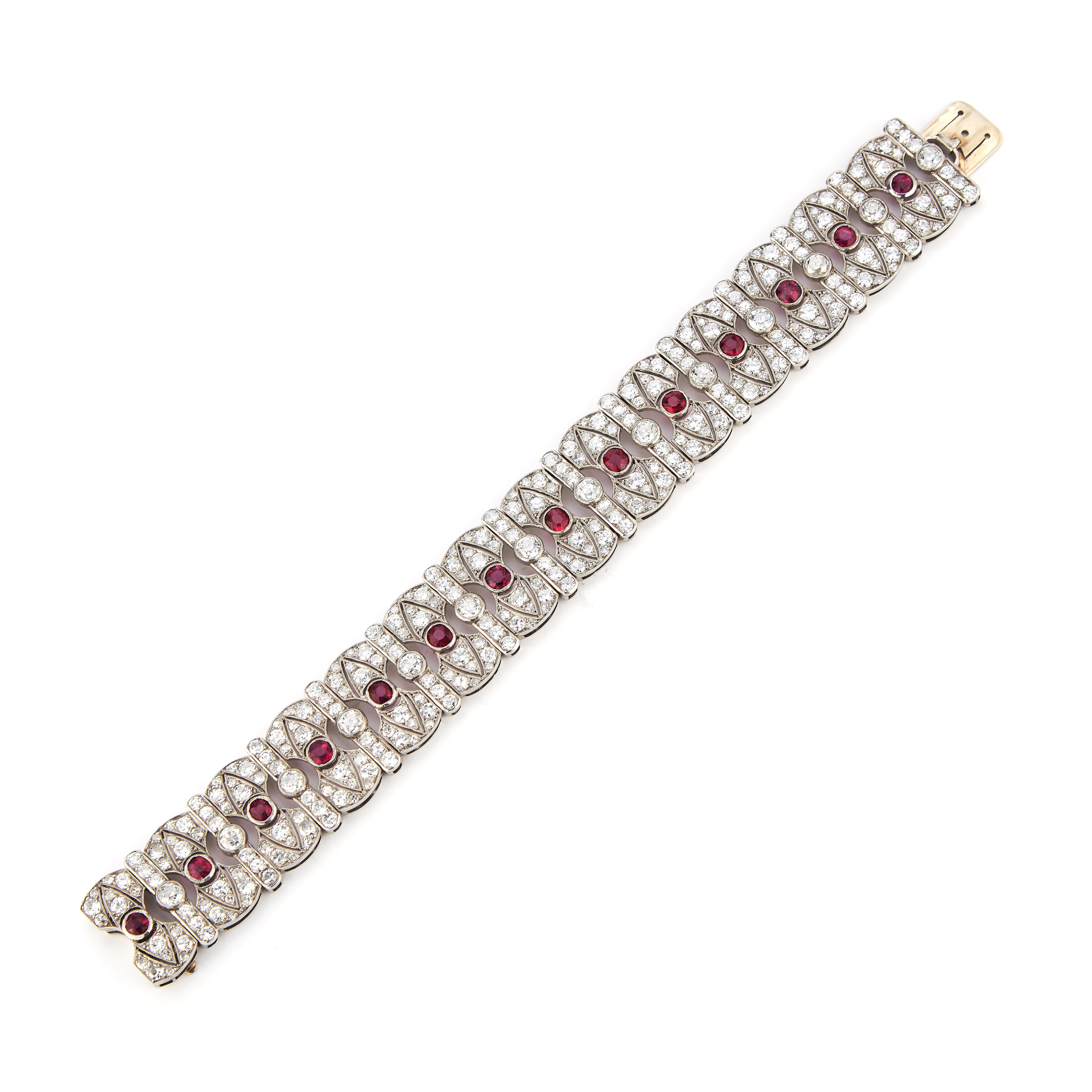 Estate Jewelry Curated by Parulina- This breath-taking bracelet features approximately 2.50ct of Rubies and approximately 20ct of Diamonds. 
Set in 18K White Gold 
7 inches in length

Metal: 18 White Gold
Gemstone Carat Weight: 2.50ct Rubies
Diamond
