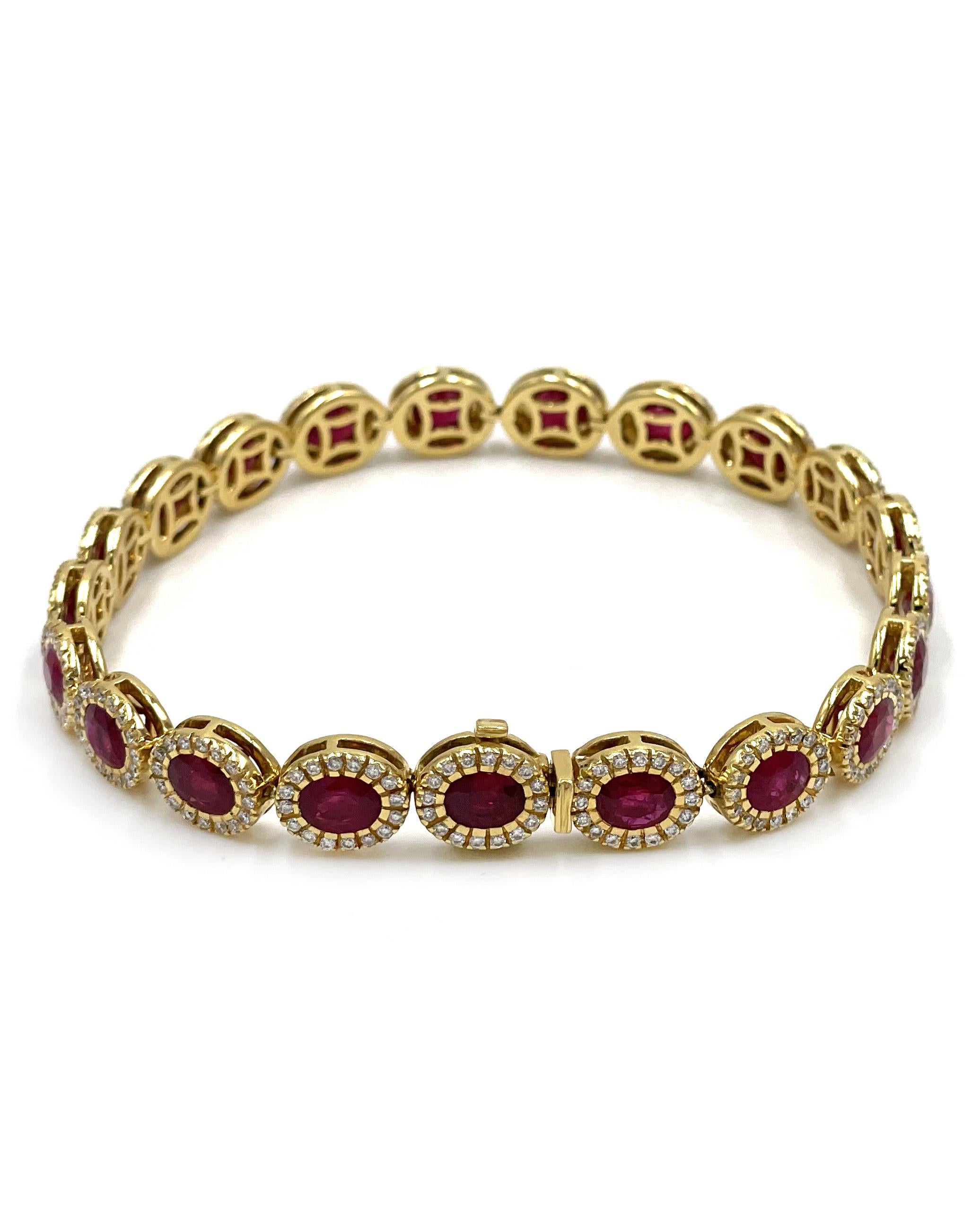 Ruby and diamond bracelet set in 18K yellow gold.  The bracelet features 21 oval cut rubies weighing 10.21 carats and 336 bround brillliant-cut diamonds weighing a total weight of 1.36 carats.

* Diamonds are on average G color, VS2/SI1 clarity
*