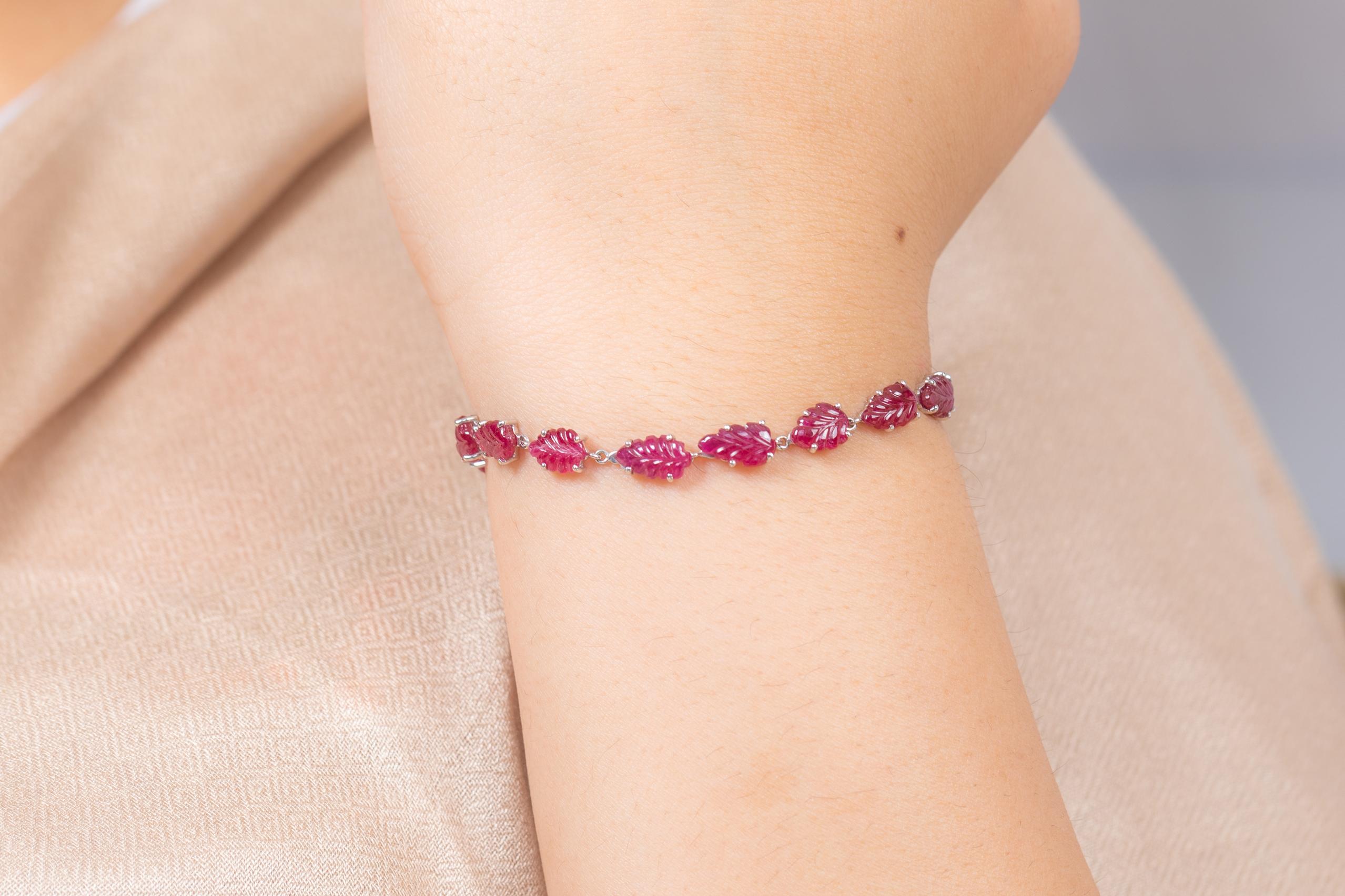 The wearing of charms may have begun as a form of amulet or talisman to ward off evil spirits or bad luck.
This ruby bracelet has a pear cut gemstone and diamonds in 18K Gold. A perfect piece of jewelry to adorn your jewelry section.

PRODUCT