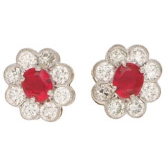 Ruby and Diamond Cluster Stud Earrings Set in 18 Karat Yellow and White Gold Ruby and Diamond Cluster Stud Earrings Set in 18 Karat Yellow and White Gold