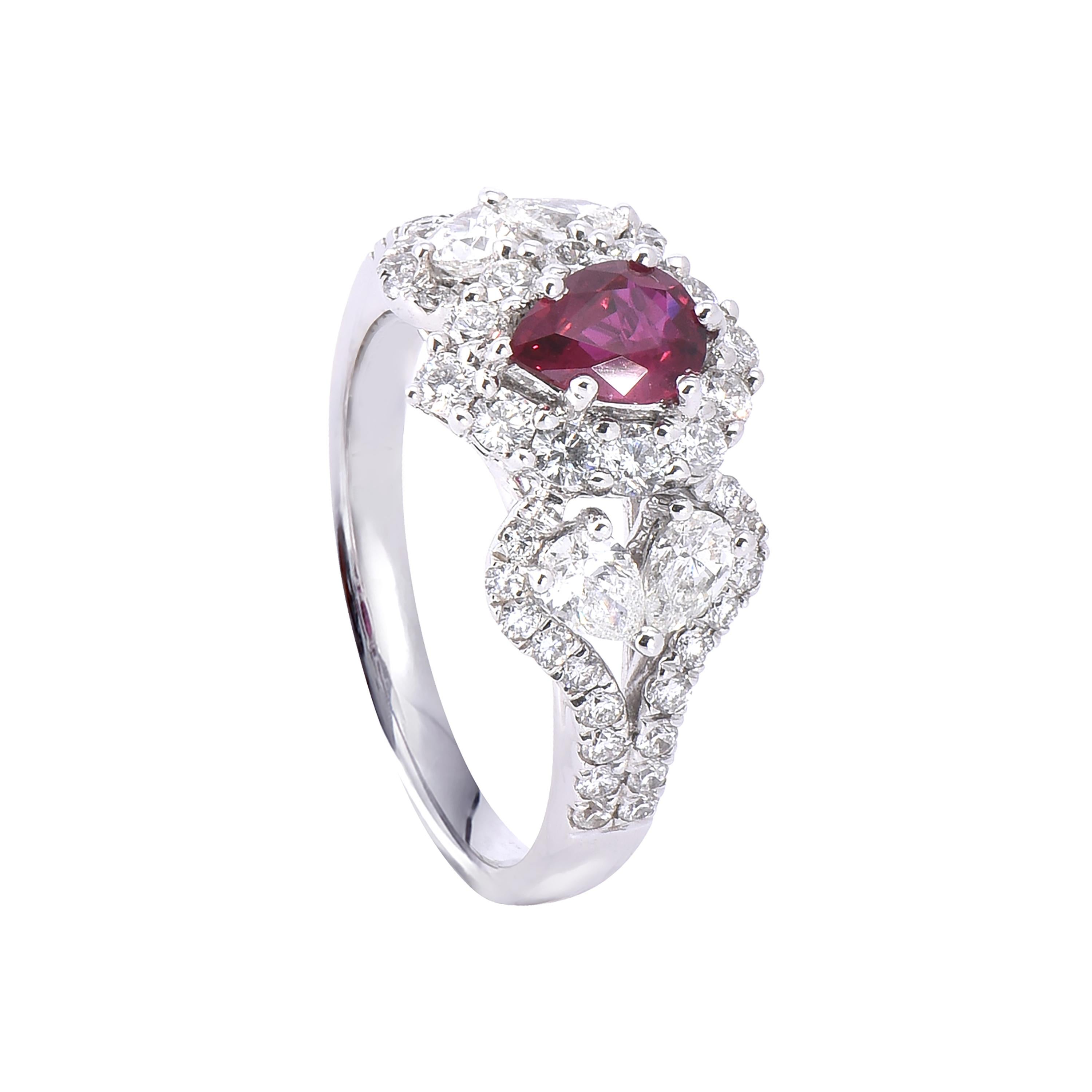 18 karat white gold ruby ring from the Venetian collection of Laviere. The ring, certified by IGI, is set with a 0.63 carats pear shape ruby, 0.75 carats round brilliant diamonds and pear shape brilliant diamonds totaling 0.49 carat.
Gold Weight