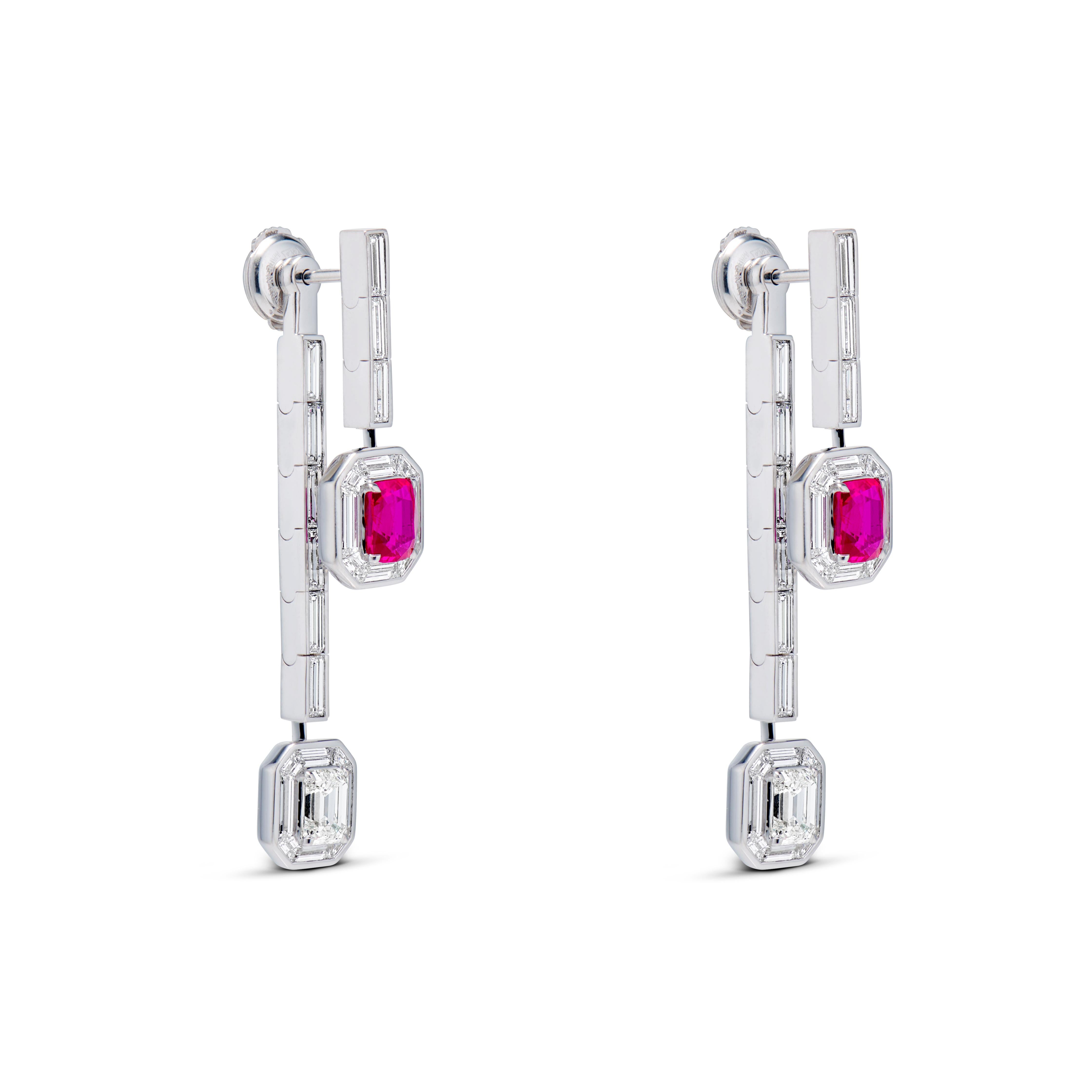From the Passion & Strength collection, the Ruby & Diamond Earrings are refined and versatile. 
They feature a pair of Mozambican no-heat rubies ensconced in a regal halo of custom-cut baguette diamonds. The ear jackets are emerald-cut diamonds