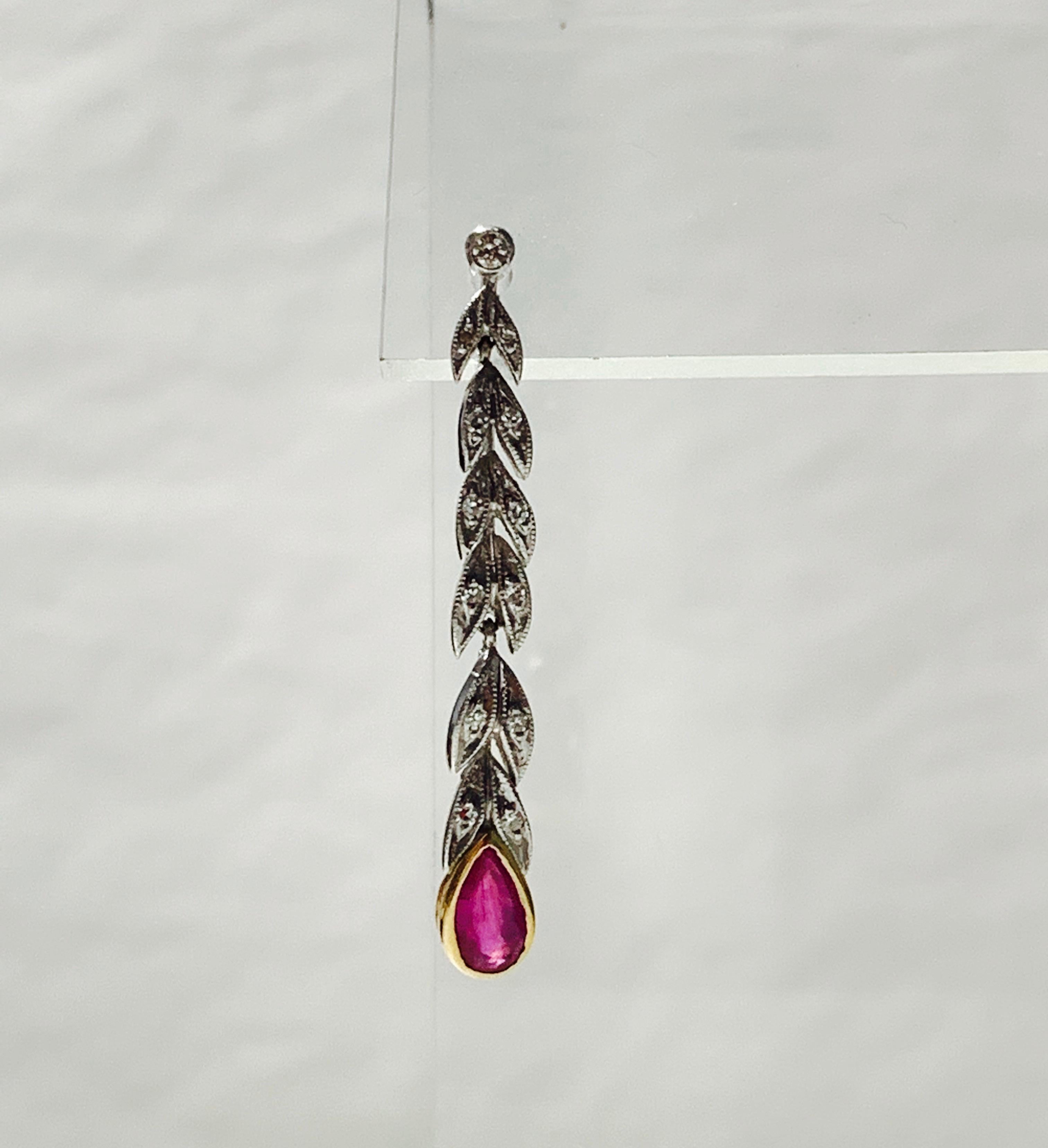 Pear Cut Ruby and Diamond Drop Earrings in Platinum and 18 Karat White Gold For Sale