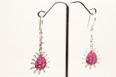 Boucles d'oreilles en or 18 carats avec rubis et diamants