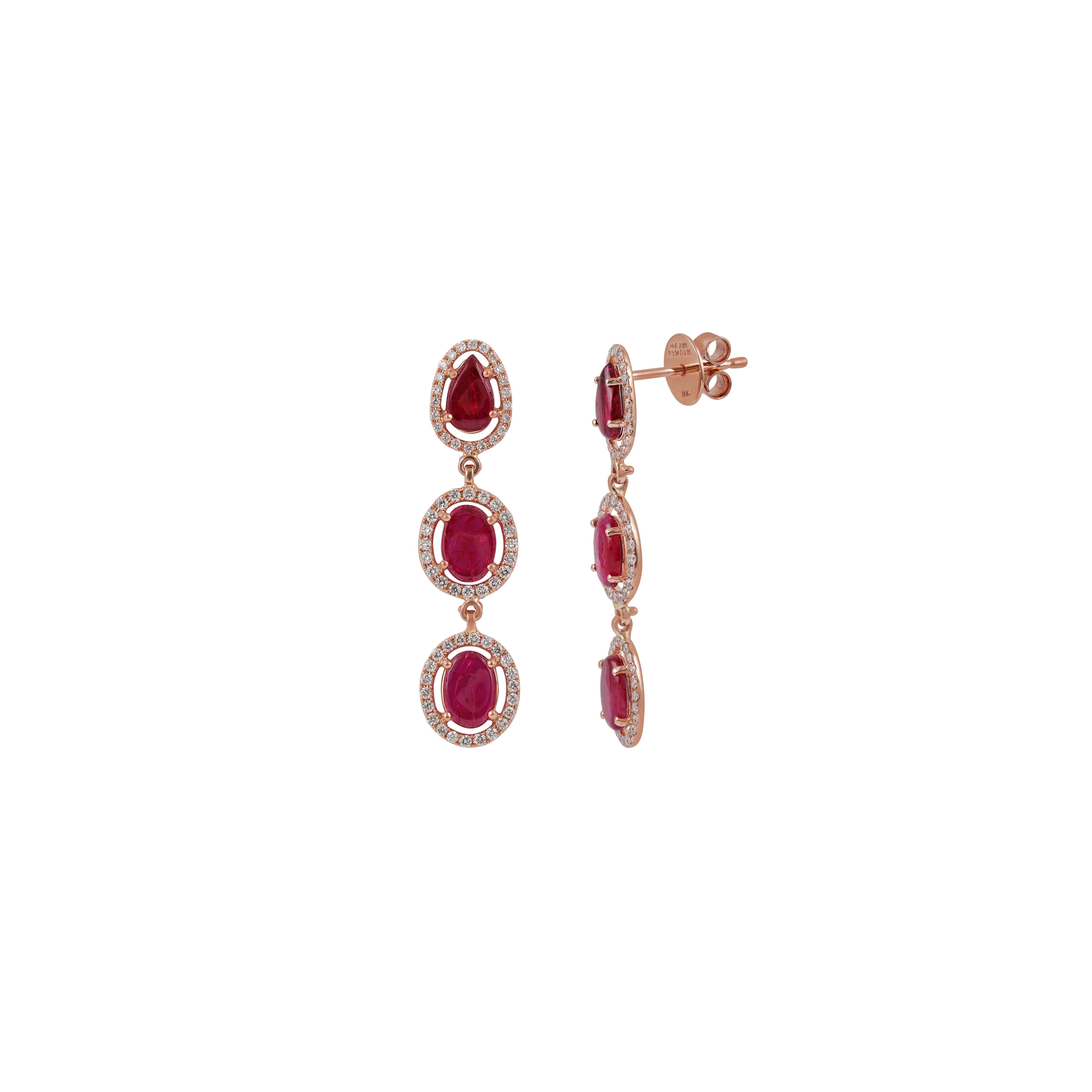 These are an exclusive earrings with ruby & diamonds features 6 pieces of rubies weight 3.94 carats, surrounded with 128 pieces of round brilliant cut of diamonds weight 0.85 carats, These entire earrings are studded in 18k rose gold weight 4.62