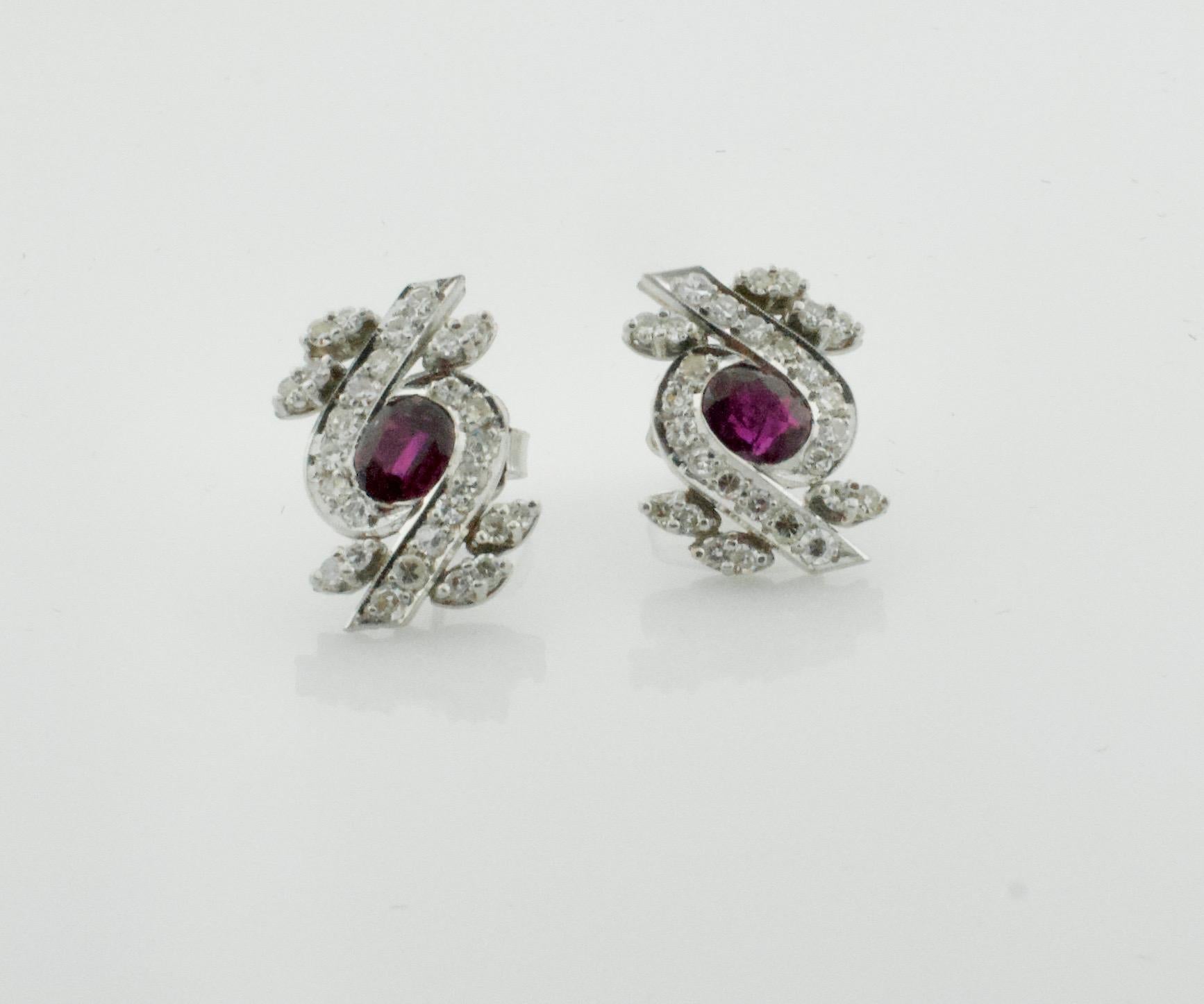 Oval Cut Ruby and Diamond Earrings circa 1930s in Platinum For Sale