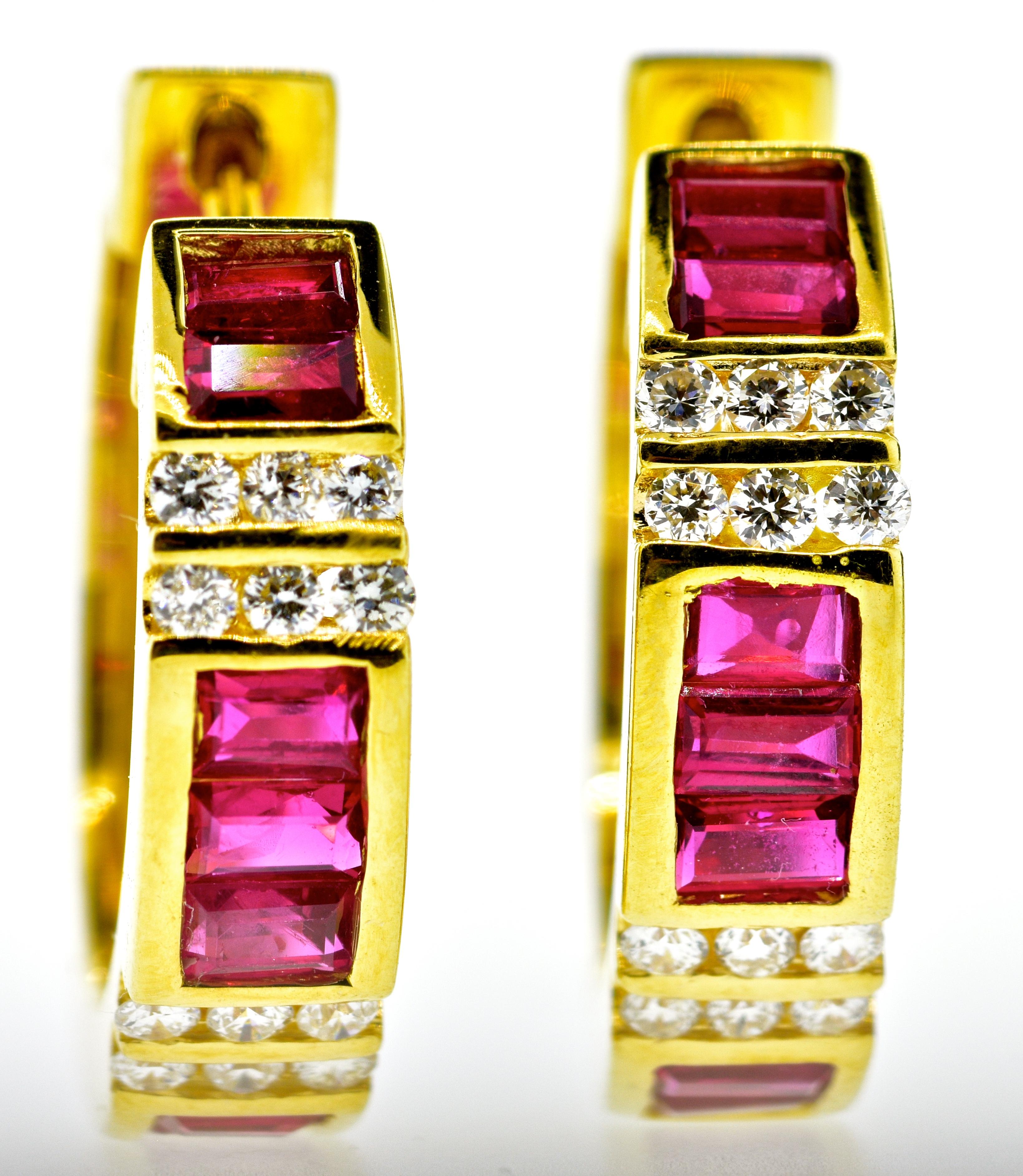 Diamond and Ruby earrings in 18K yellow gold.  There are 14 baguette cut natural bright red rubies weighing an estimated .70 cts.  Fine white brilliant cut diamonds, near colorless and very slightly included, VS1, are interspersed between the  rows