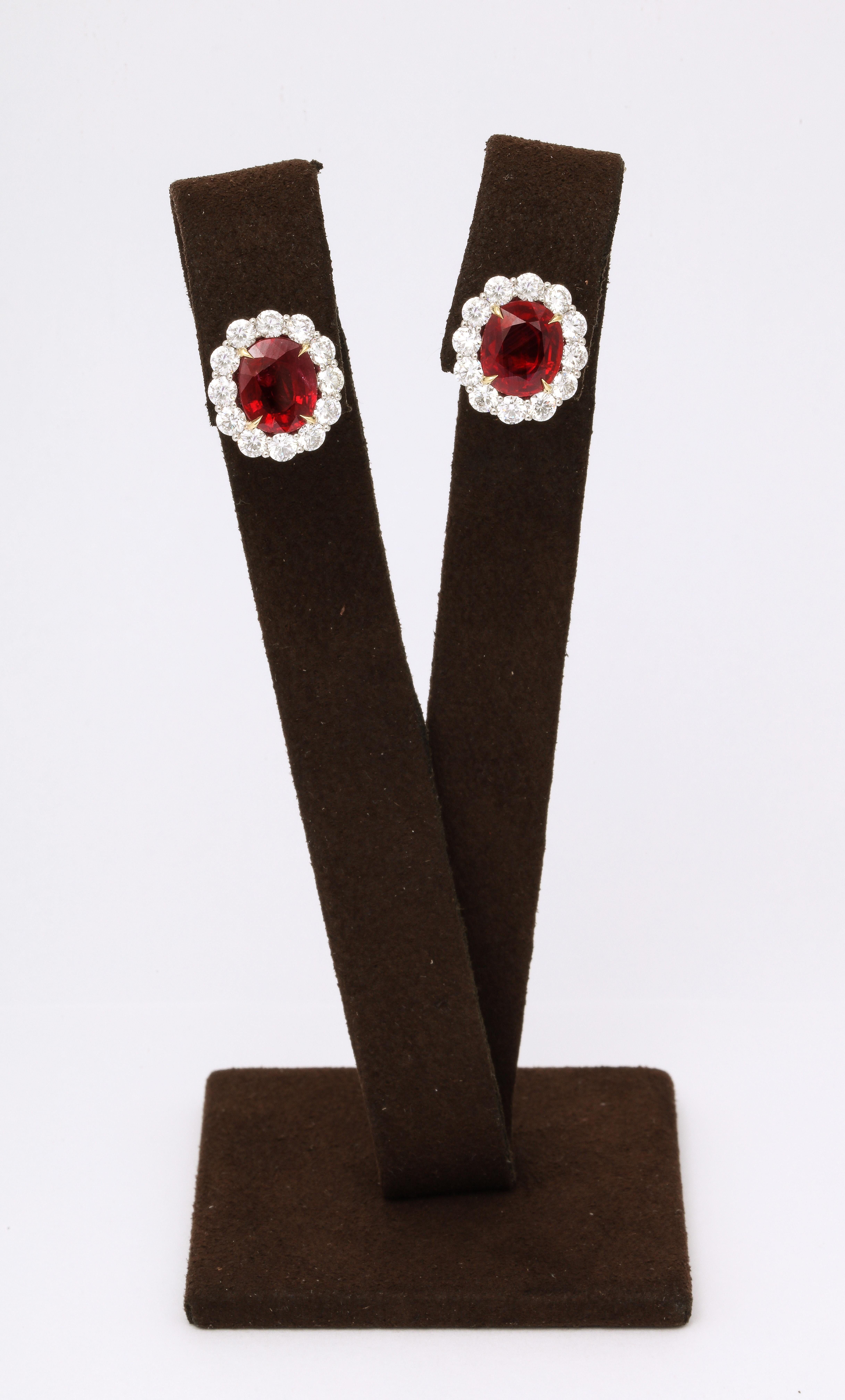 
A pair of timeless high quality Certified “Pigeon blood” rubies. 

6.25 carats of Vivid Red oval Ruby

2.28 carats of colorless white diamonds 

Set in a custom made 18k white gold mounting. 

Approximate measurements: 14.7 mm x 13.2mm 
