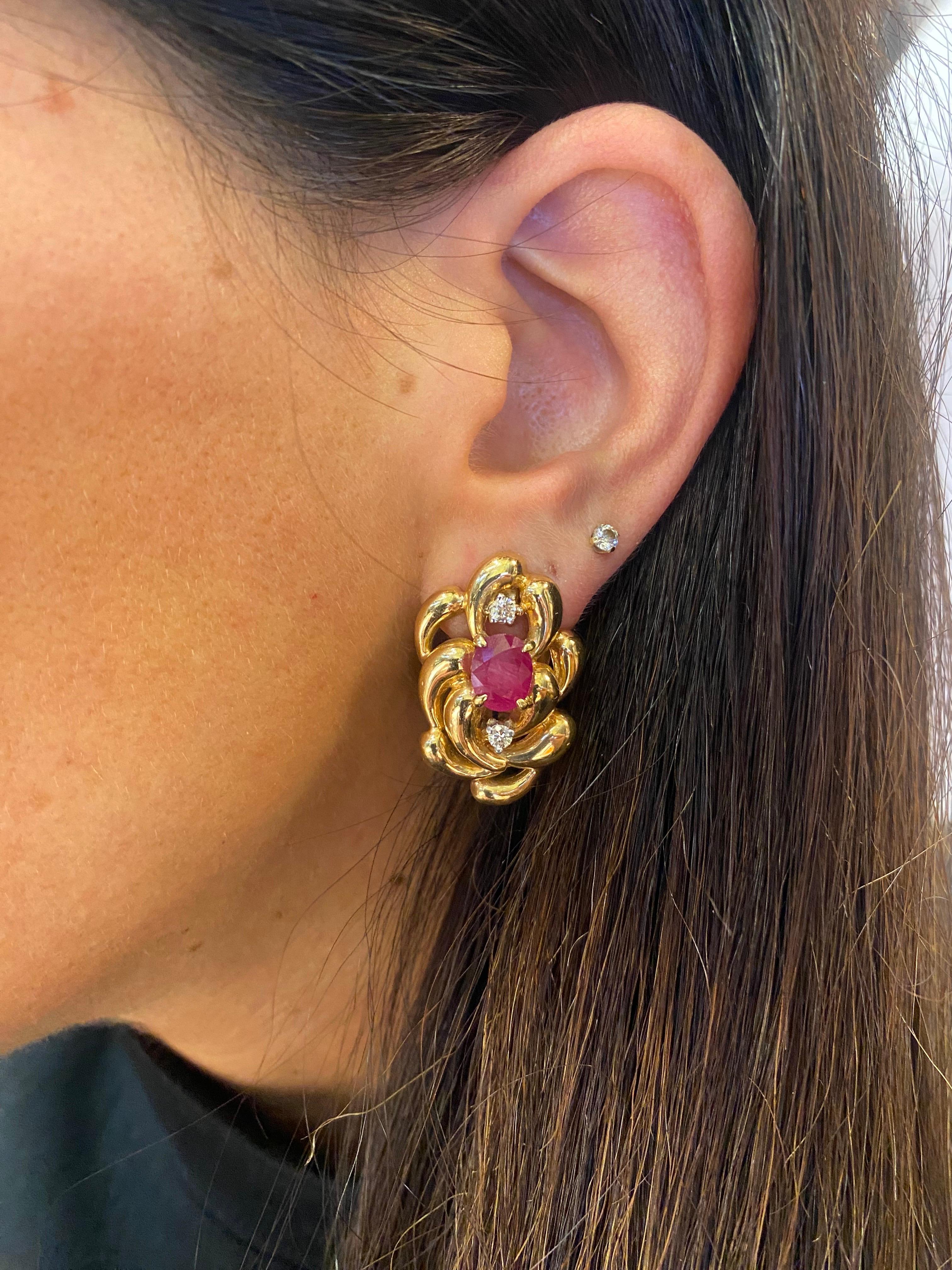 Ruby and Diamond Earrings

A pair of earrings set with oval-cut rubies and two round-cut diamonds.

Approximate Combined Weights
Rubies: 2 Carat
Diamonds: 0.6 Carats

Measures approximately 1