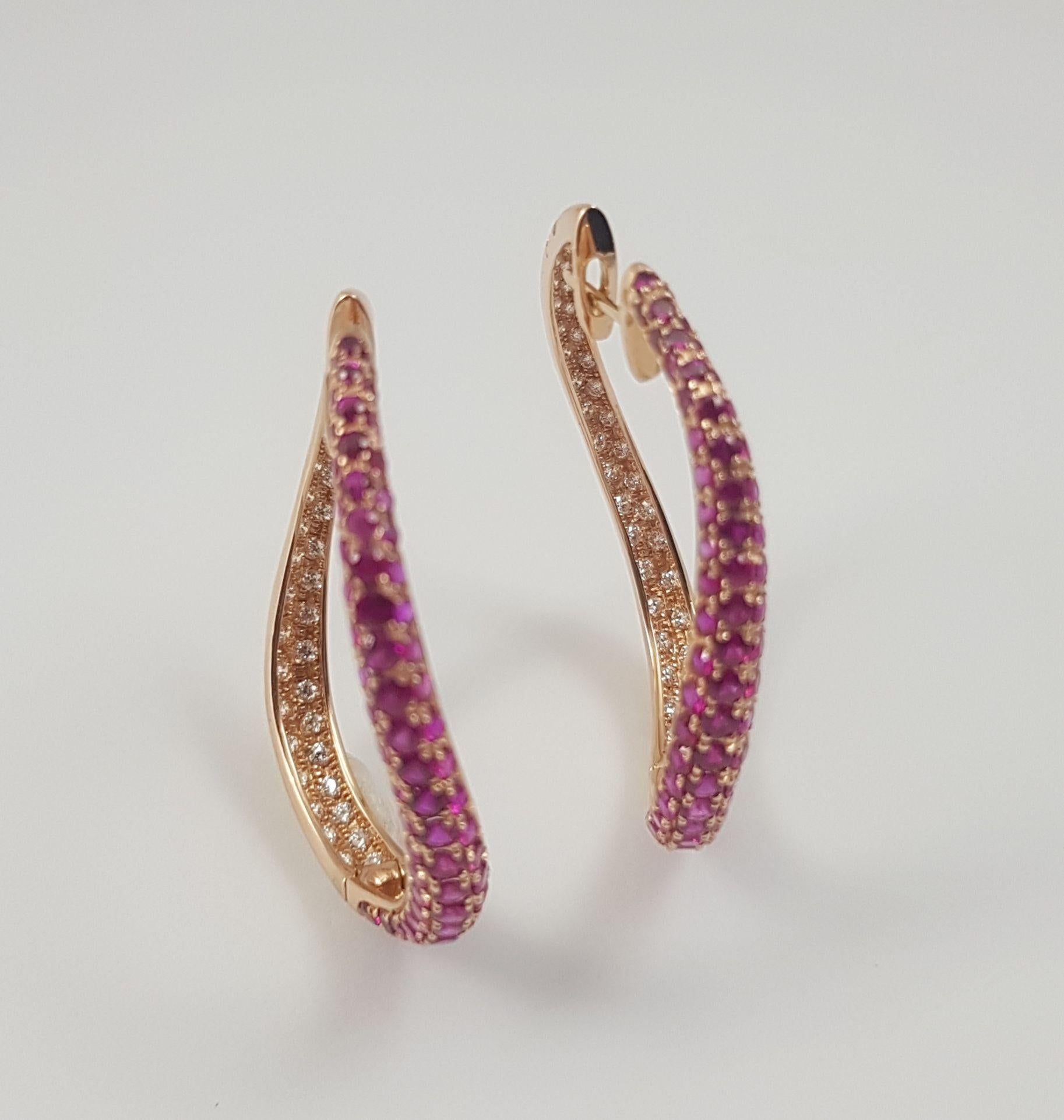 Ruby 5.66 carats and Diamond 0.93 carats Earrings set in 18K Rose Gold Settings 


Width:  0.4 cm
Diameter:  4.0 cm


