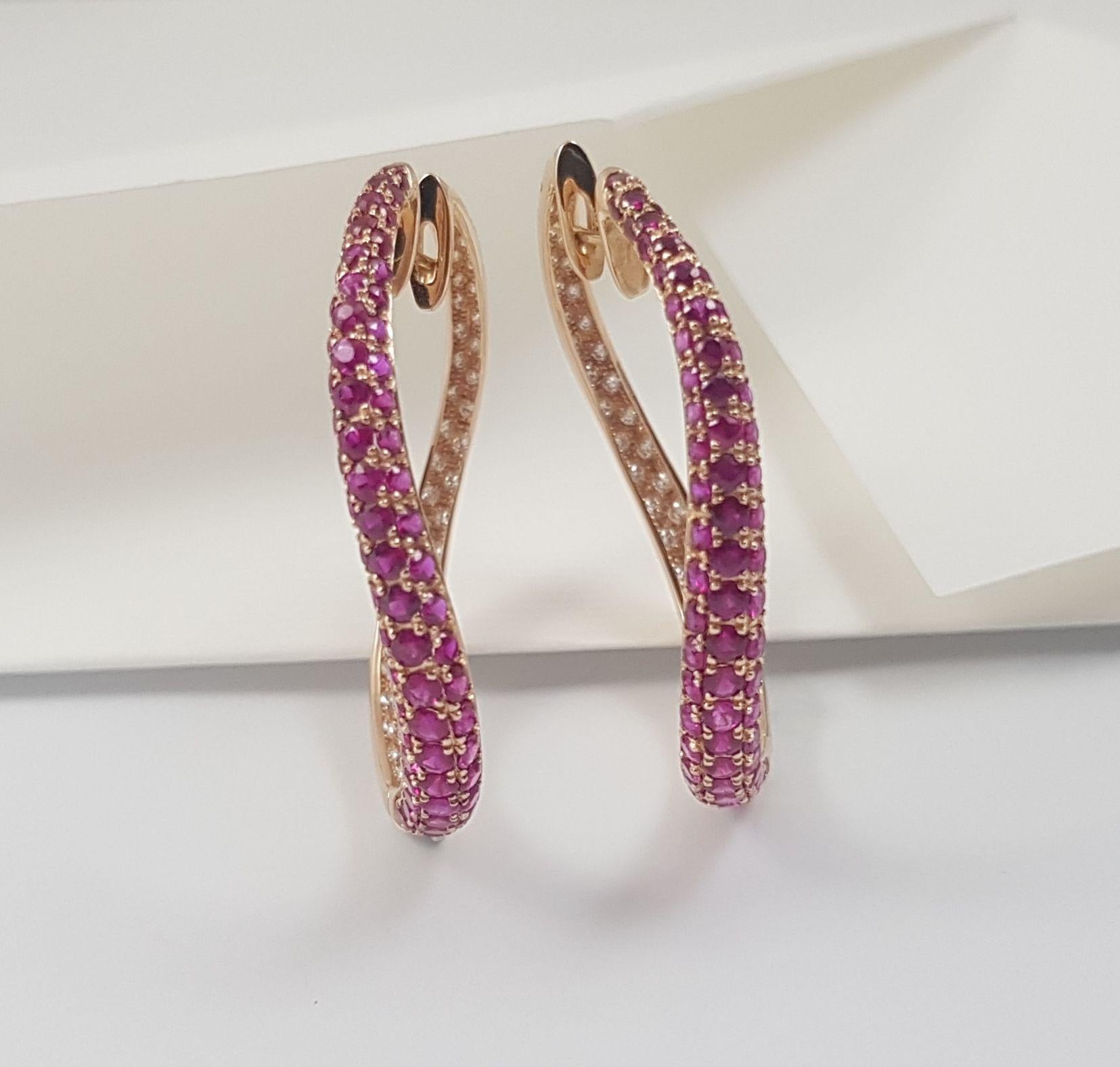 Women's Ruby and Diamond Earrings set in 18K Rose Gold Settings  For Sale