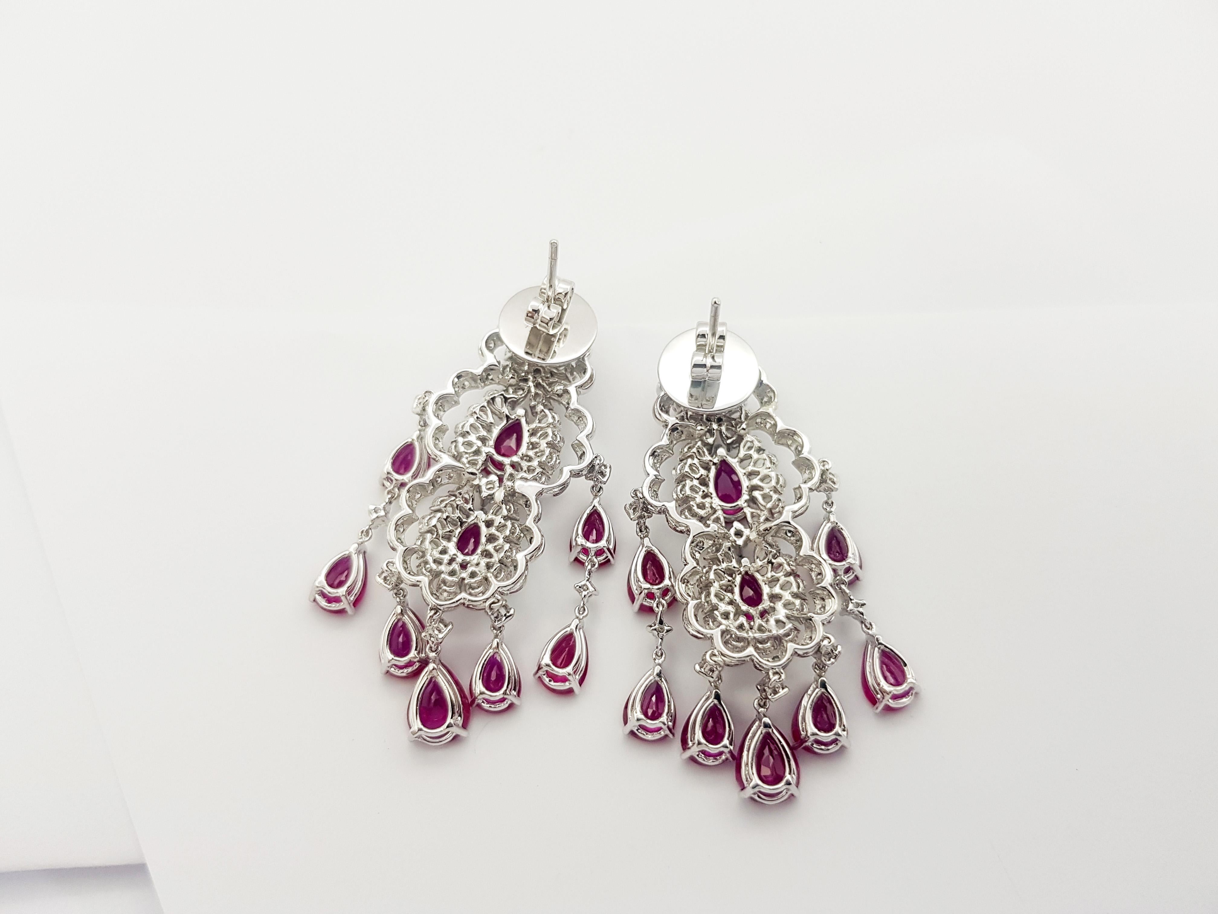 Pear Cut Ruby and Diamond Earrings set in 18K White Gold Setting For Sale
