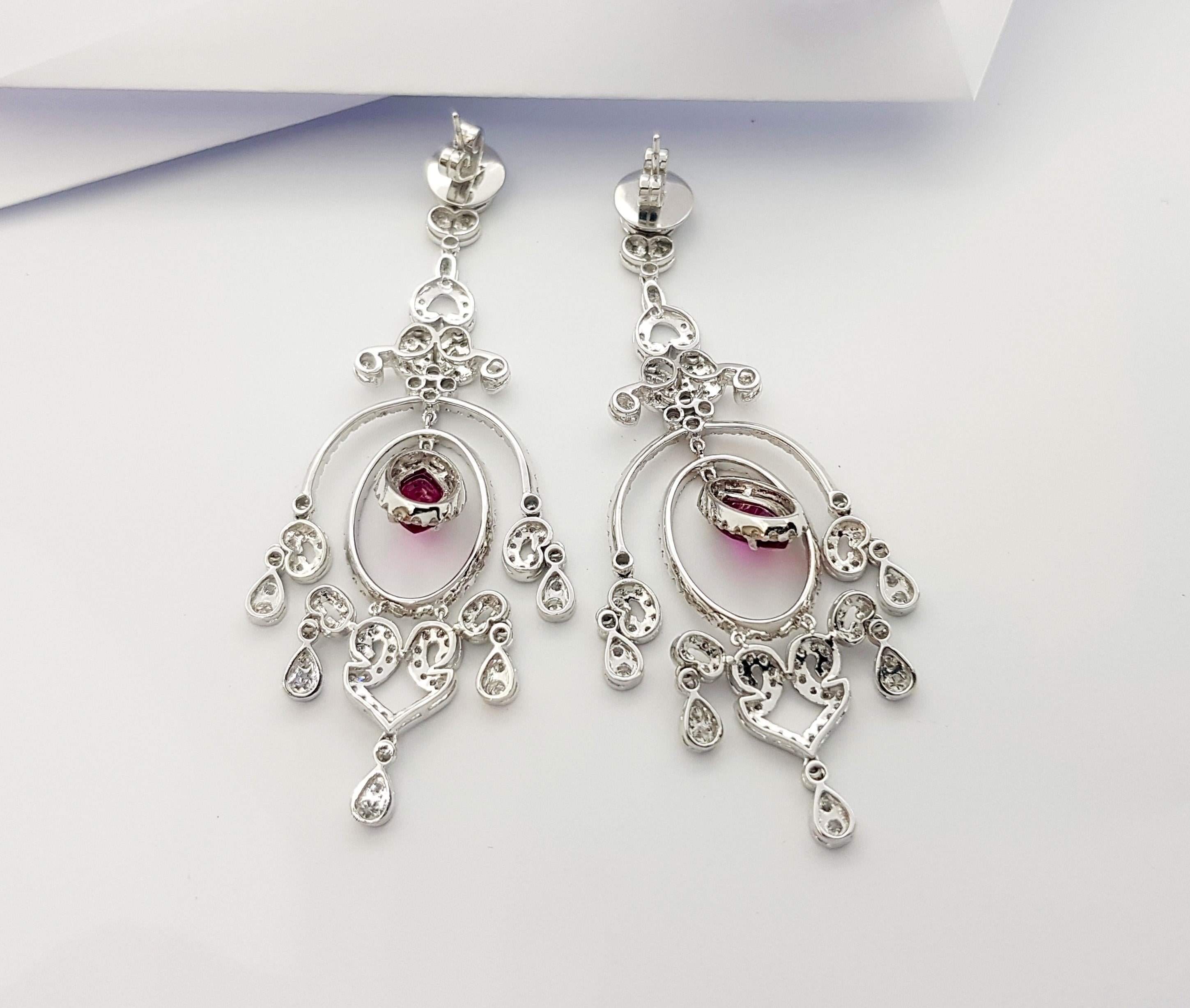 Women's Ruby and Diamond Earrings set in 18K White Gold Settings For Sale