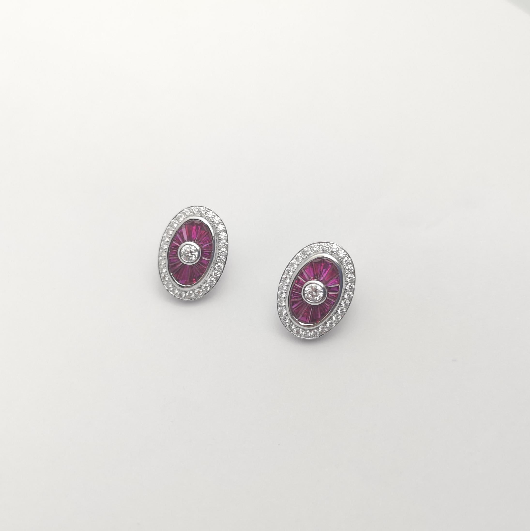 Women's Ruby and Diamond Earrings set in 18K White Gold Settings For Sale