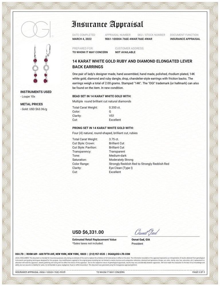 Fourteen karat white gold elongated lever back hoop earrings
Six round rubies weighing 3.20 carats
Rubies measuring from 4.5 millimeter to 3.75 millimeter
Rubies are naturally mined in Burma with hue tone of lustrous pigeon blood red color
Diamonds