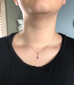 Collier pendentif filigrane en rubis et diamants