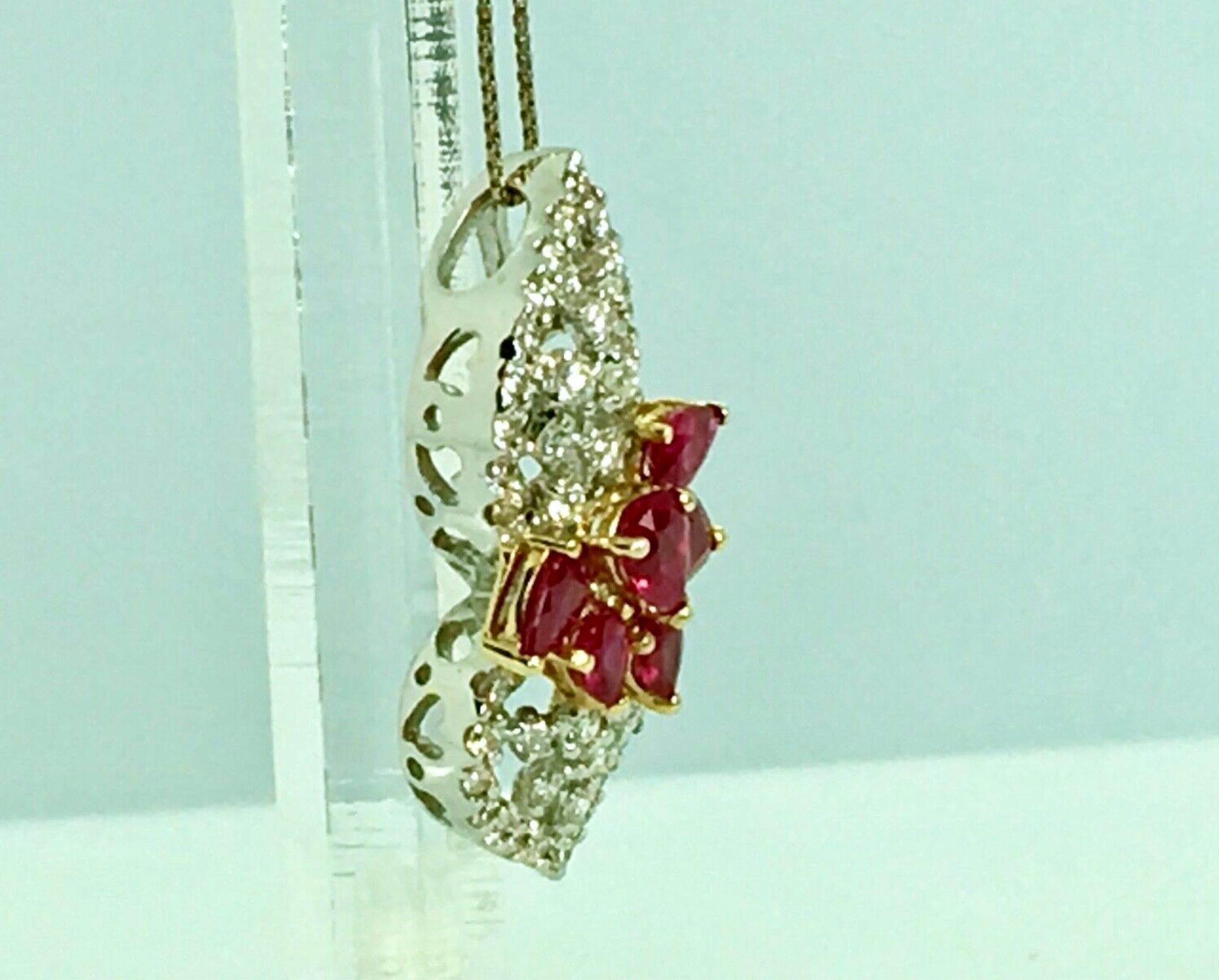 Contemporary Ruby and Diamond Floral Drop Pendant 18 Karat For Sale