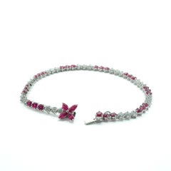 Ruby and Diamond Flower 18 Karat White Gold Tennis Bracelet with Ruby Flower