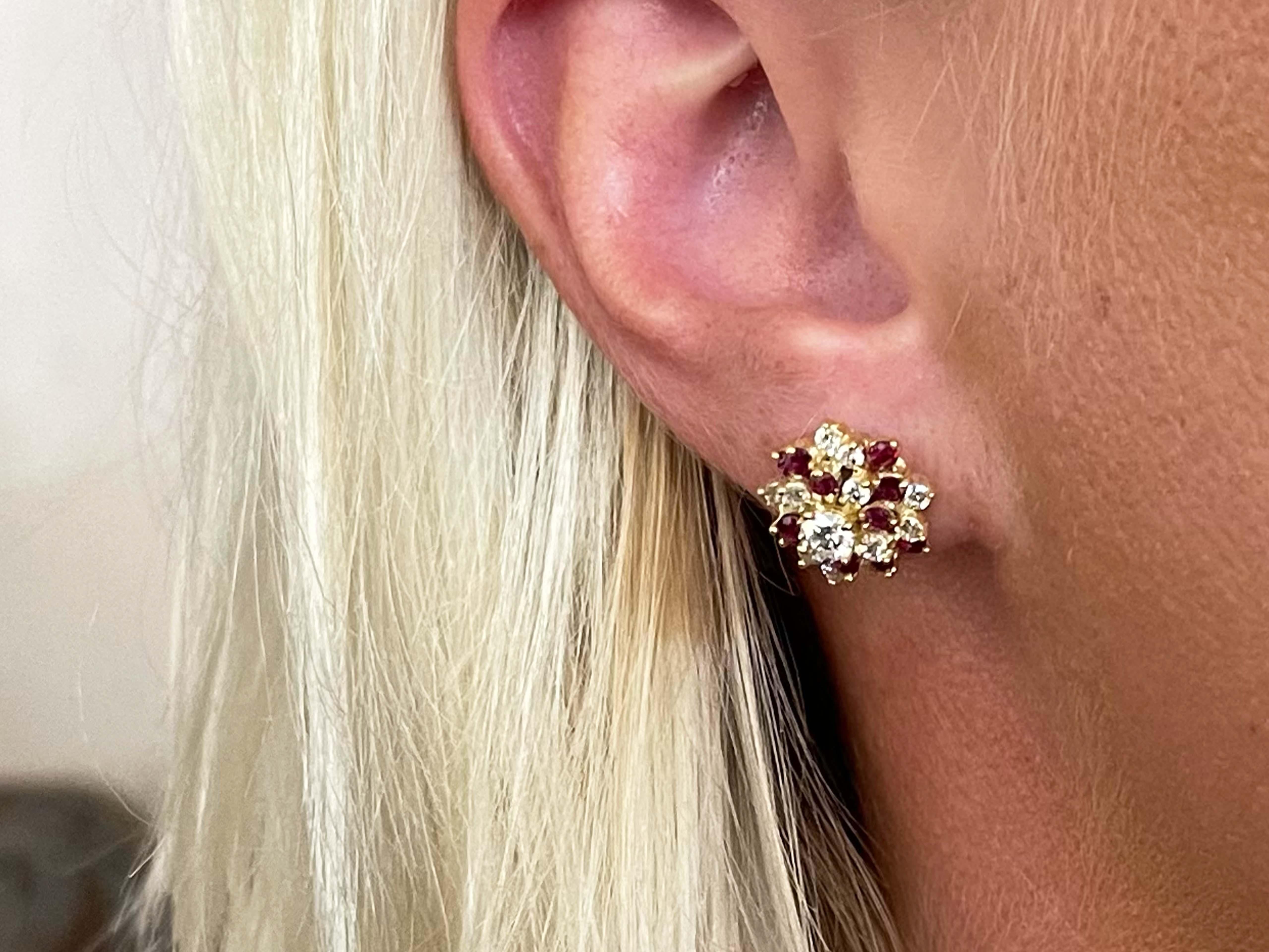 Earrings Specifications:

Metal: 14k Yellow Gold

Earring Diameter: 13.8 mm

Total Weight: 4.9 Grams

Diamond Count: 26 brilliant cut

Diamond Color: F-G

Diamond Clarity: VS2-SI1

Ruby Setting: Prong

Ruby Total Count: 24

Ruby Carat Weight: ~0.70