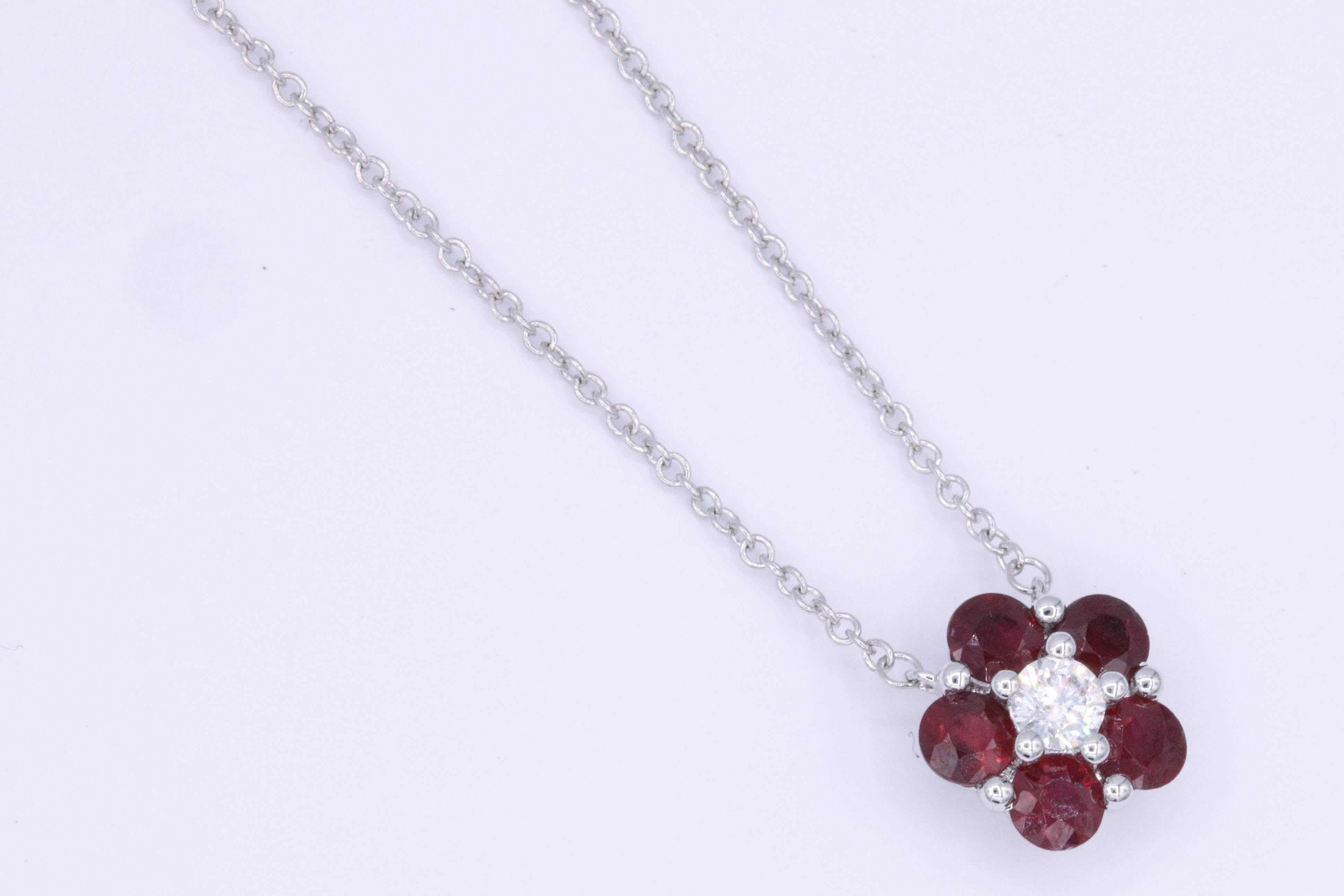 18K white Gold
5 Ruby 0.95 cts.
1 round Diamond 0.13 cts
It comes with a chain