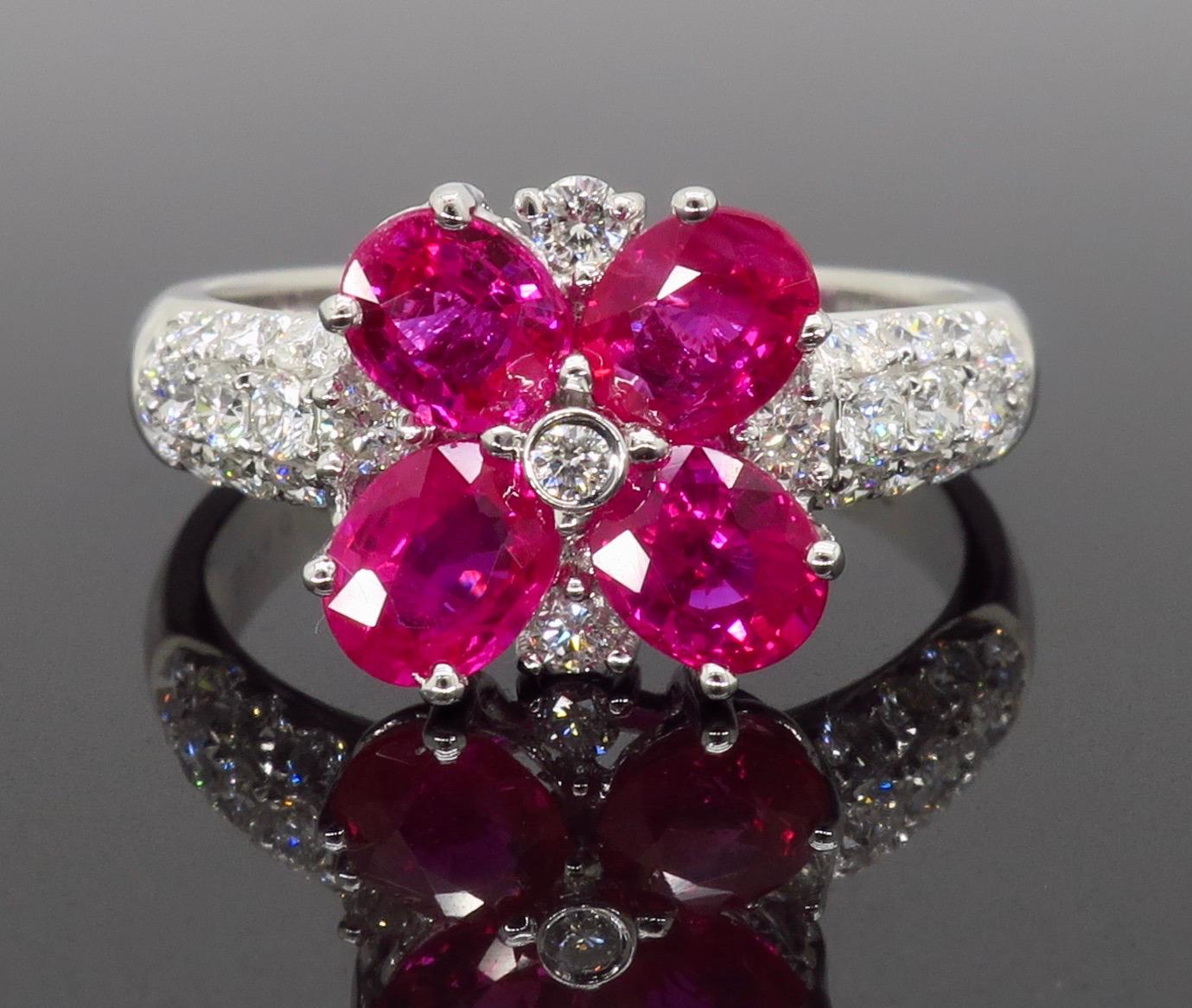 Oval Cut Ruby and Diamond Flower Ring in 18 Karat White Gold