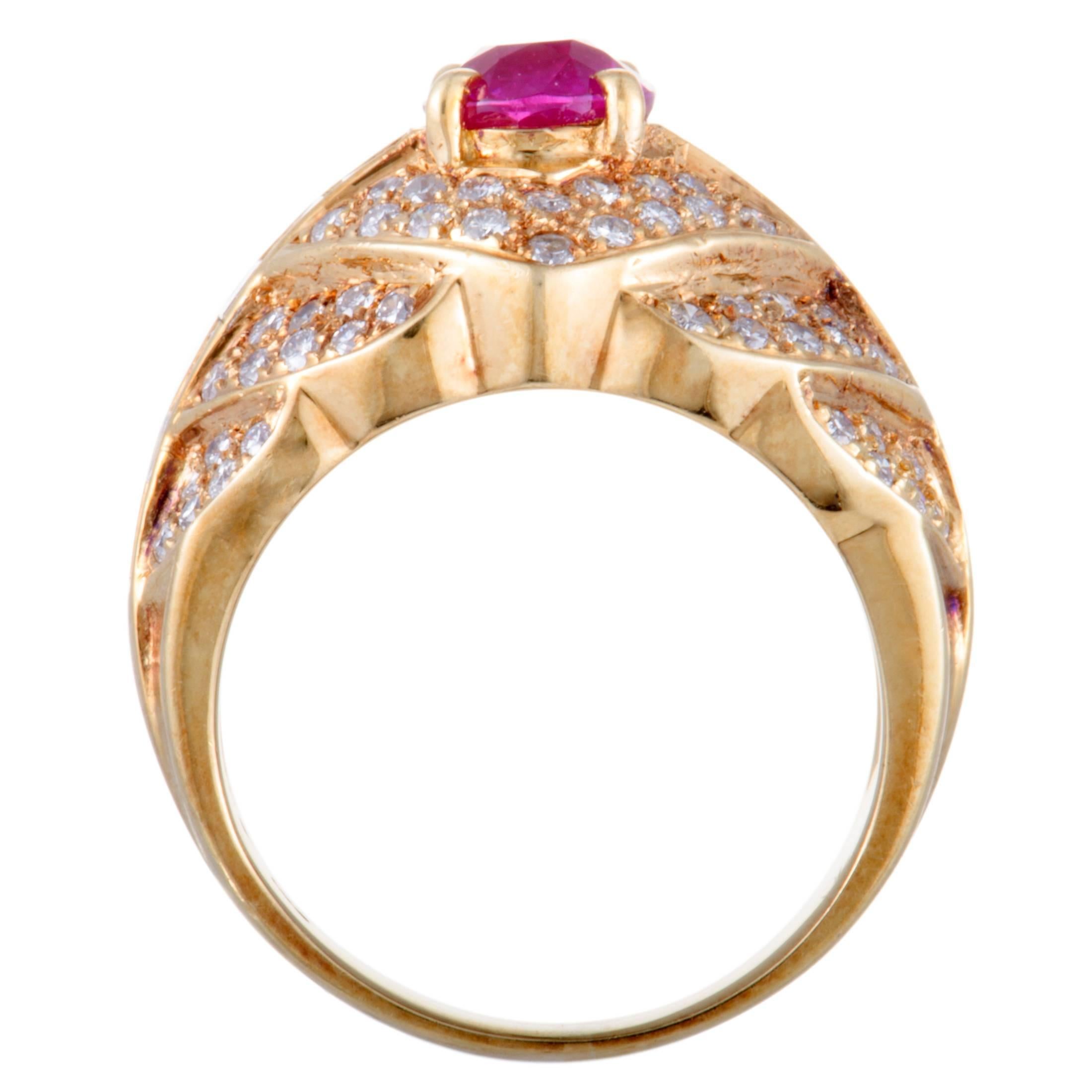 Luxuriously decorated with a plethora of irresistibly resplendent gems, this ravishing ring offers an exceptionally extravagant appearance. Crafted from alluring 18K yellow gold, the ring is set with a total of 1.45 carats of diamonds and with an