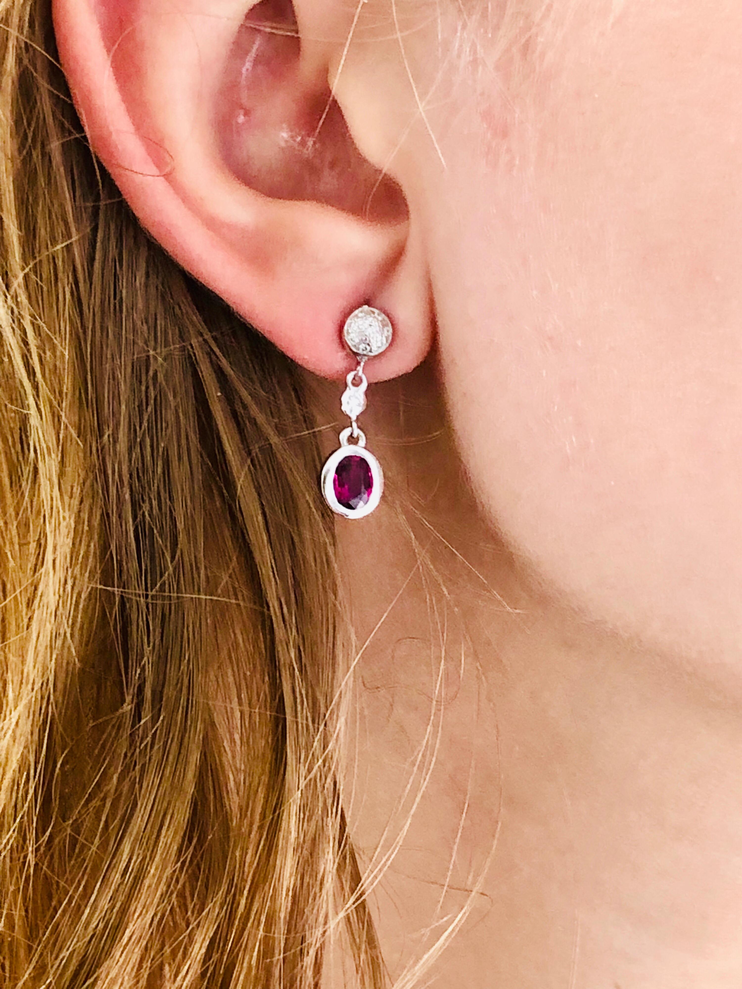Oval Cut Oval Ruby and Diamond Bezel Set Gold Drop Earrings