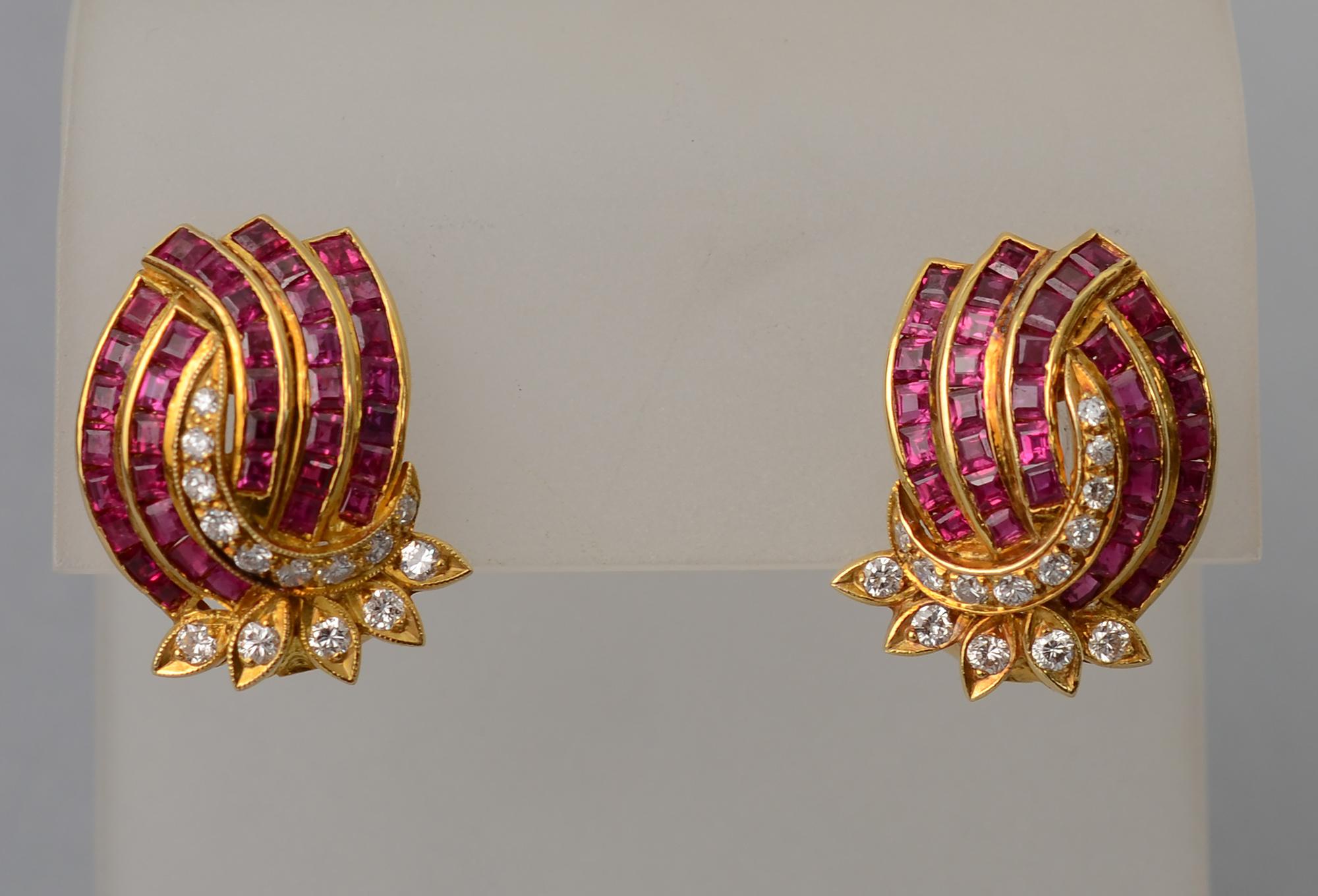 Delicate and graceful ruby and diamond earrings set in 18 karat gold. 
Round diamonds and square cut rubies combine beautifully together. Backs are clips and collapsible posts. 