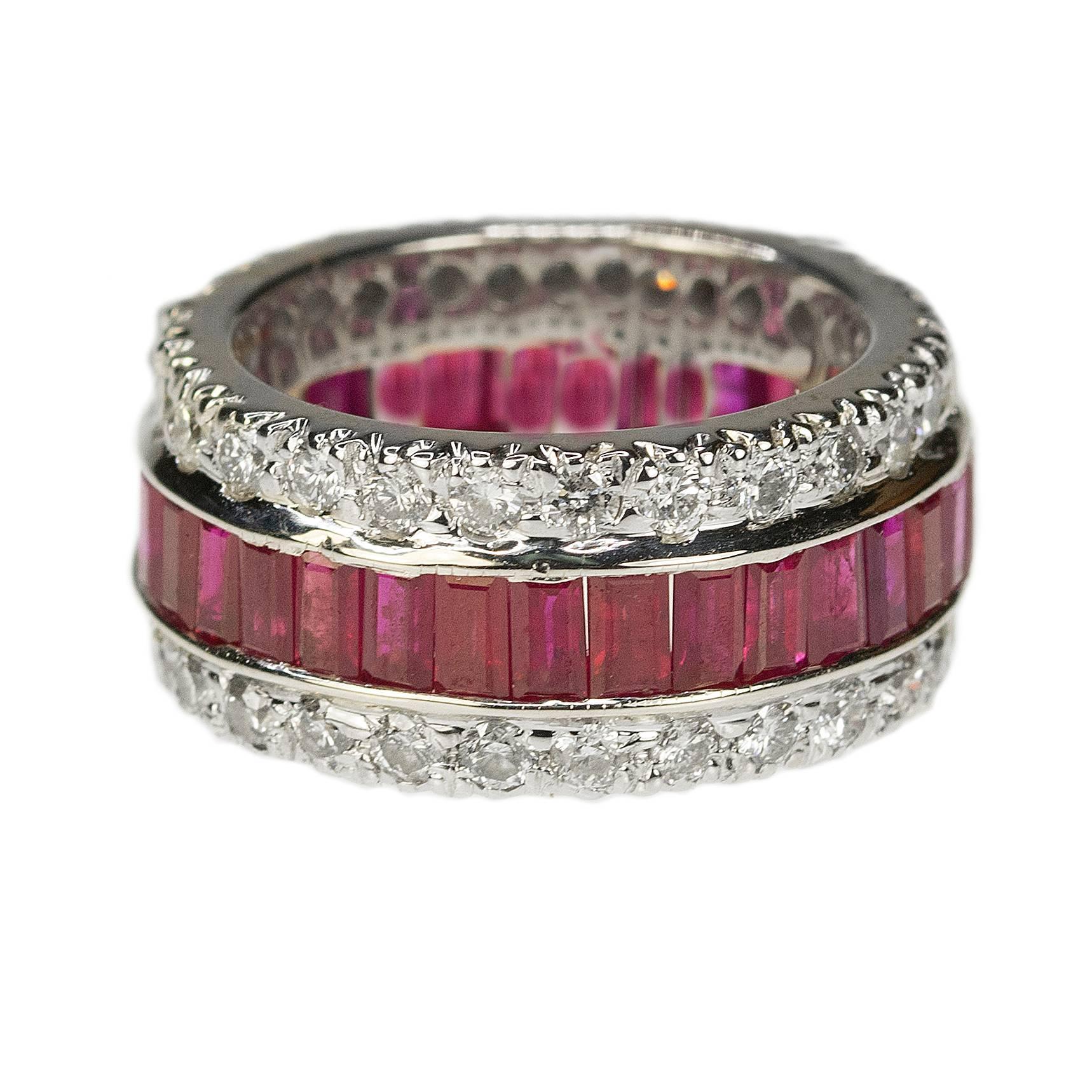 18k white gold Ruby & Diamond Eternity Band with 33 emerald cut rubies weighing approximately 4.25 carats and 54 modern round brilliant diamonds weighing approximately 2.16 carats, 11.58g