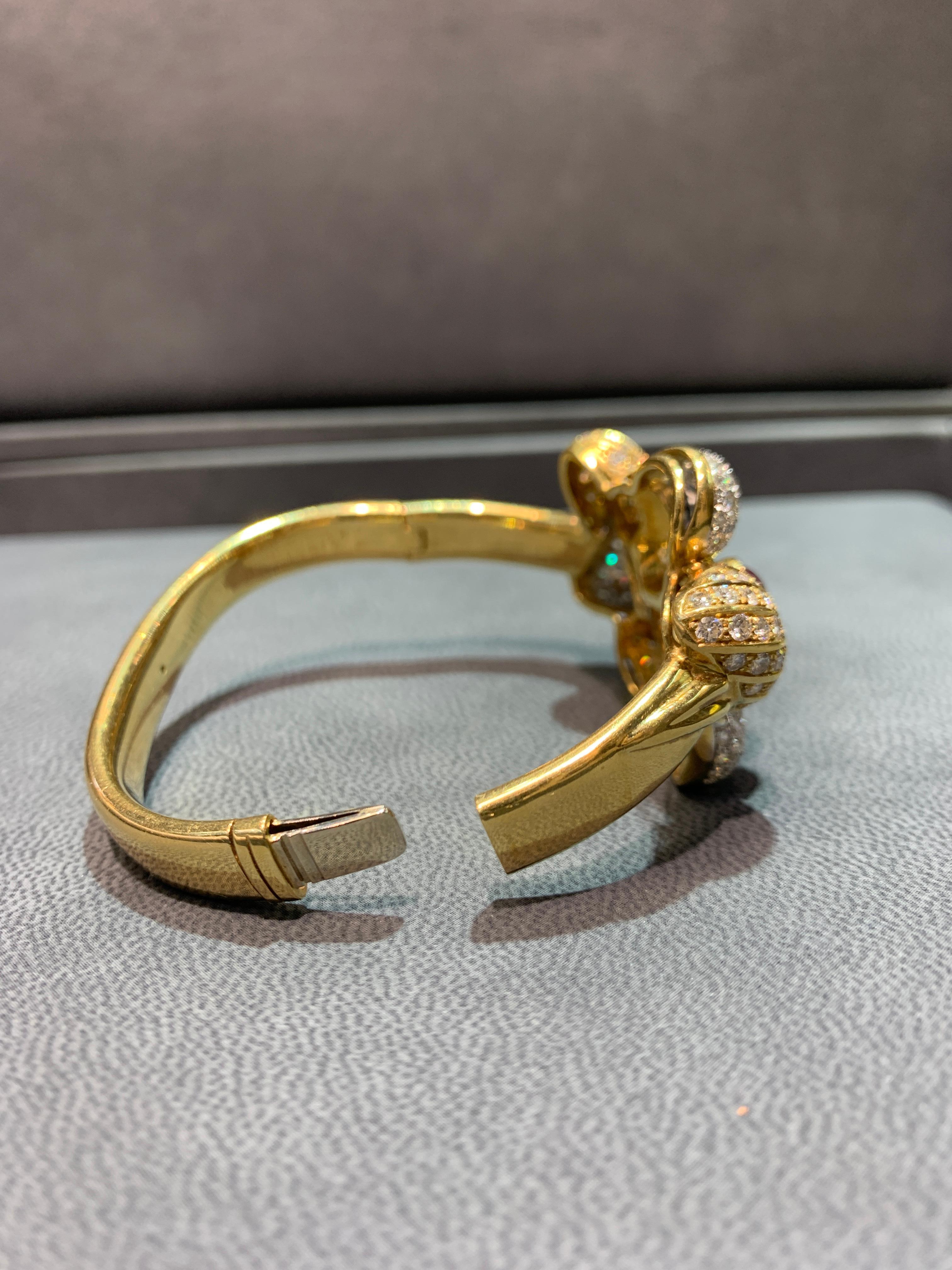 Cabochon Ruby and Diamond Gold Flower Bangle Bracelet For Sale