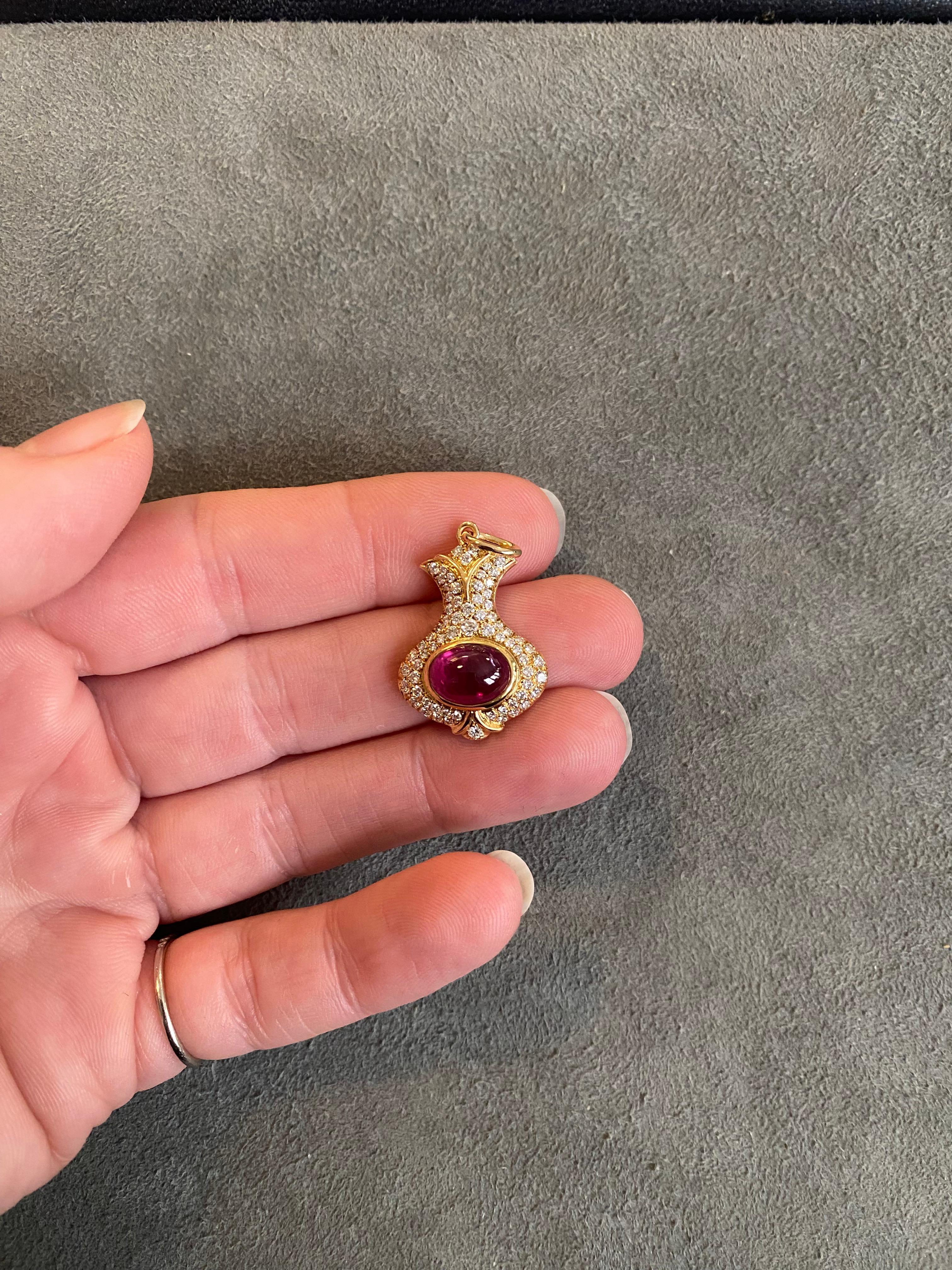 Cabochon Ruby and diamond gold pendant For Sale