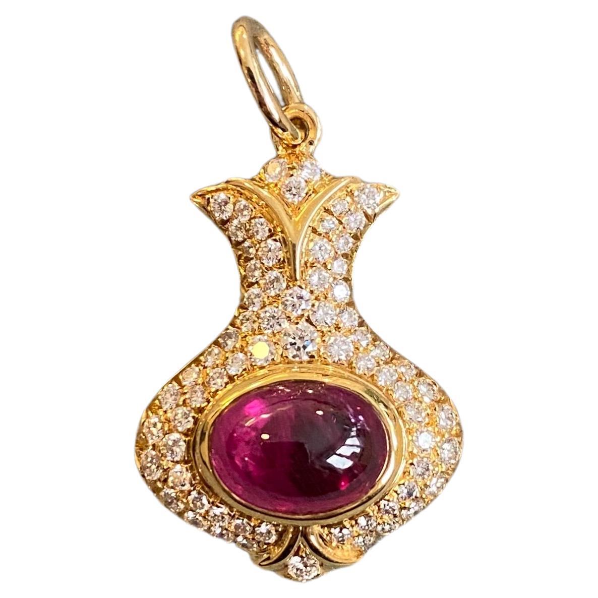 Ruby and diamond gold pendant