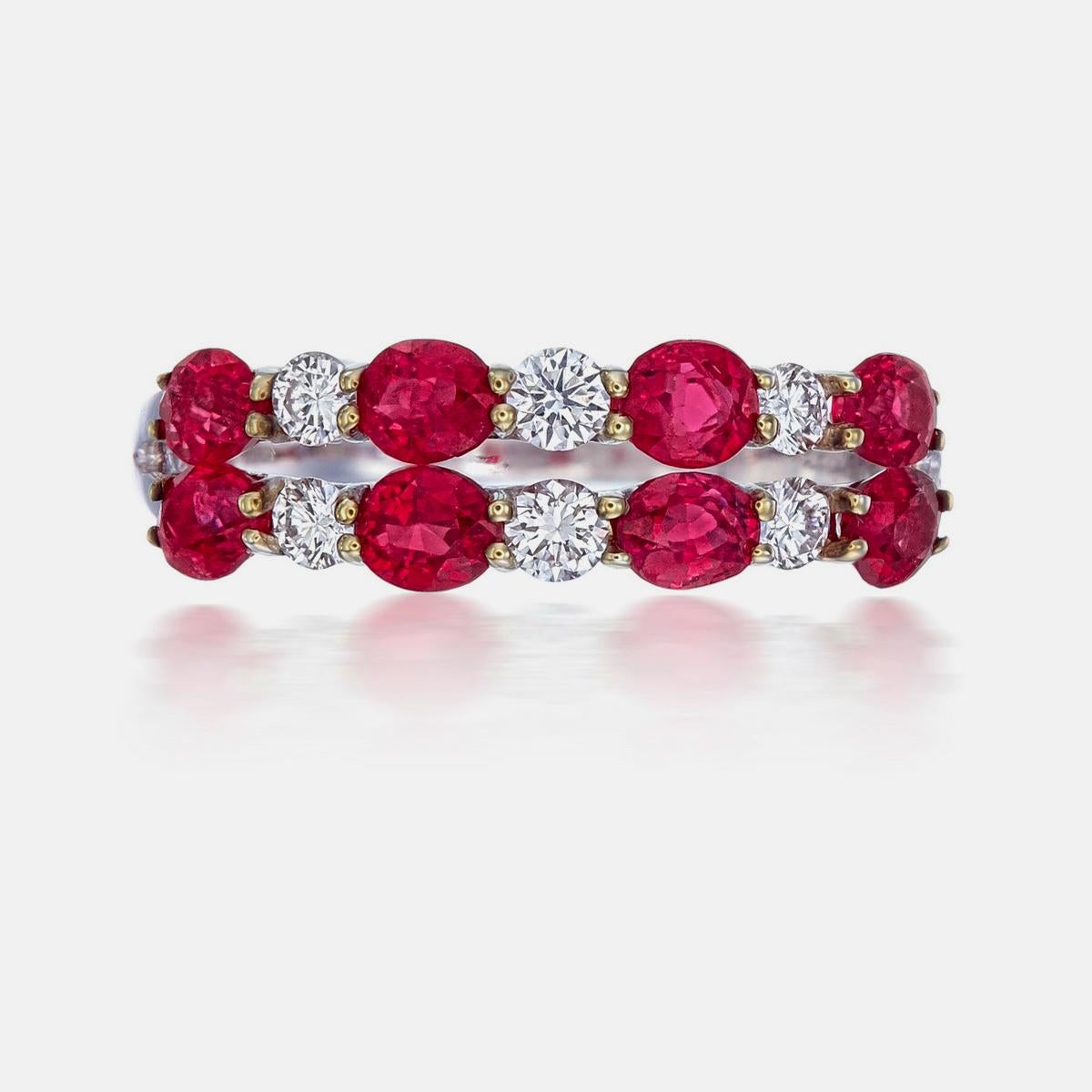 

A fine modern ruby and diamond ring, providing a subtle elegance with a personal flair; perfect for lifestyle wear.

    8 Oval rubies: 1.40 carat
    Every ruby is from Burma and natural without any treatment
    6 Round diamonds: 0.25 carat
   