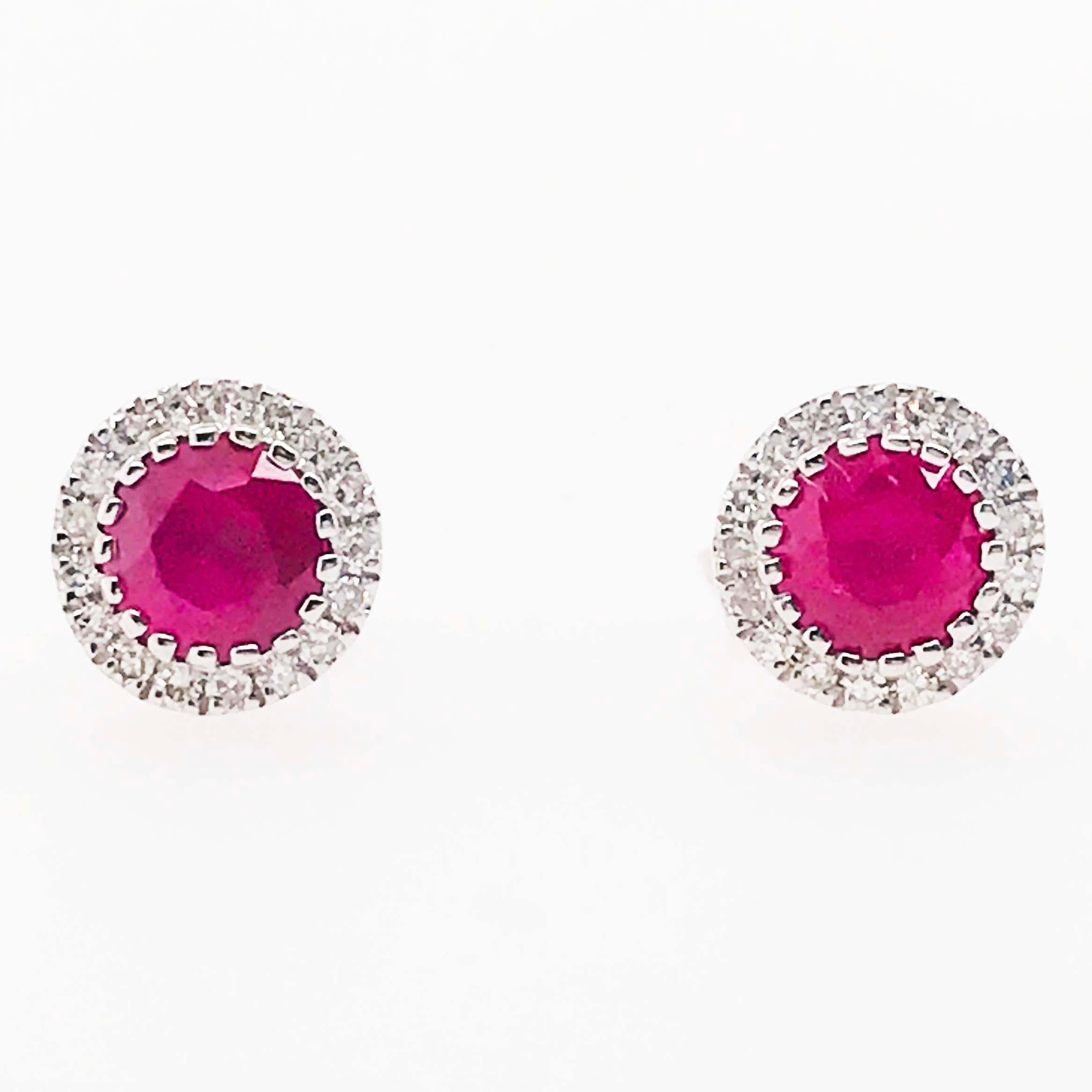 These genuine ruby and diamond earring studs are stunning! With a round, faceted shaped ruby gemstone set at the bottom of each earring, framed with a diamond halo that sparkles and compliments the ruby beautifully. These ruby stud earrings are