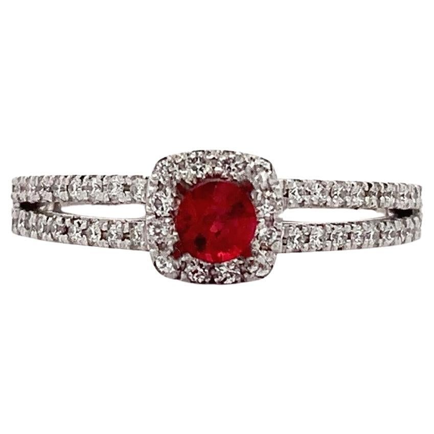 Ruby and diamond halo engagement ring 18k white gold