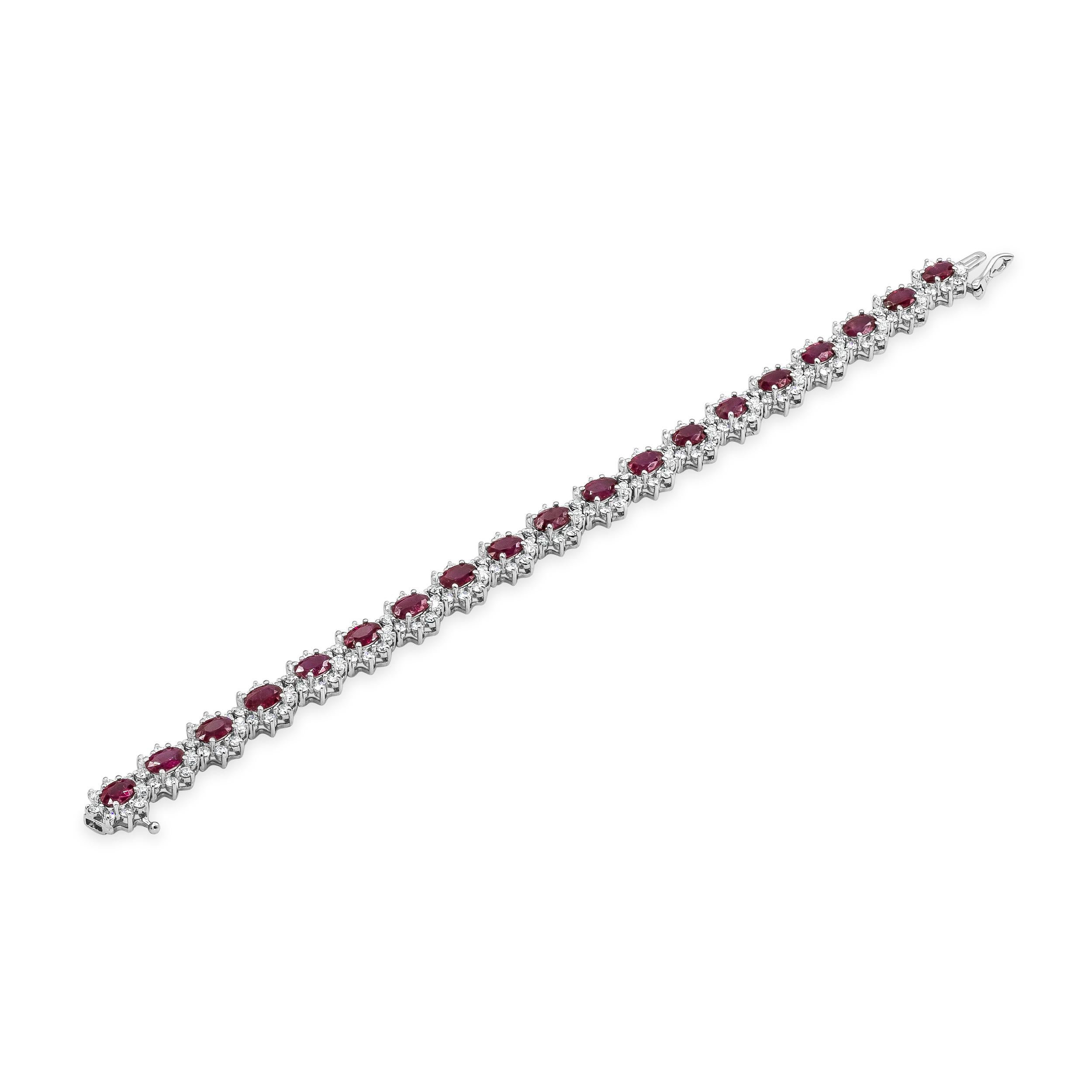 A brilliant tennis bracelet showcasing oval cut rubies weighing 10.15 carats total, surrounded with round diamond weighing 5.01 carats total. Set in a Flower-Motif design. Made with 18K White Gold. 7 inches in Length.

Roman Malakov is a custom