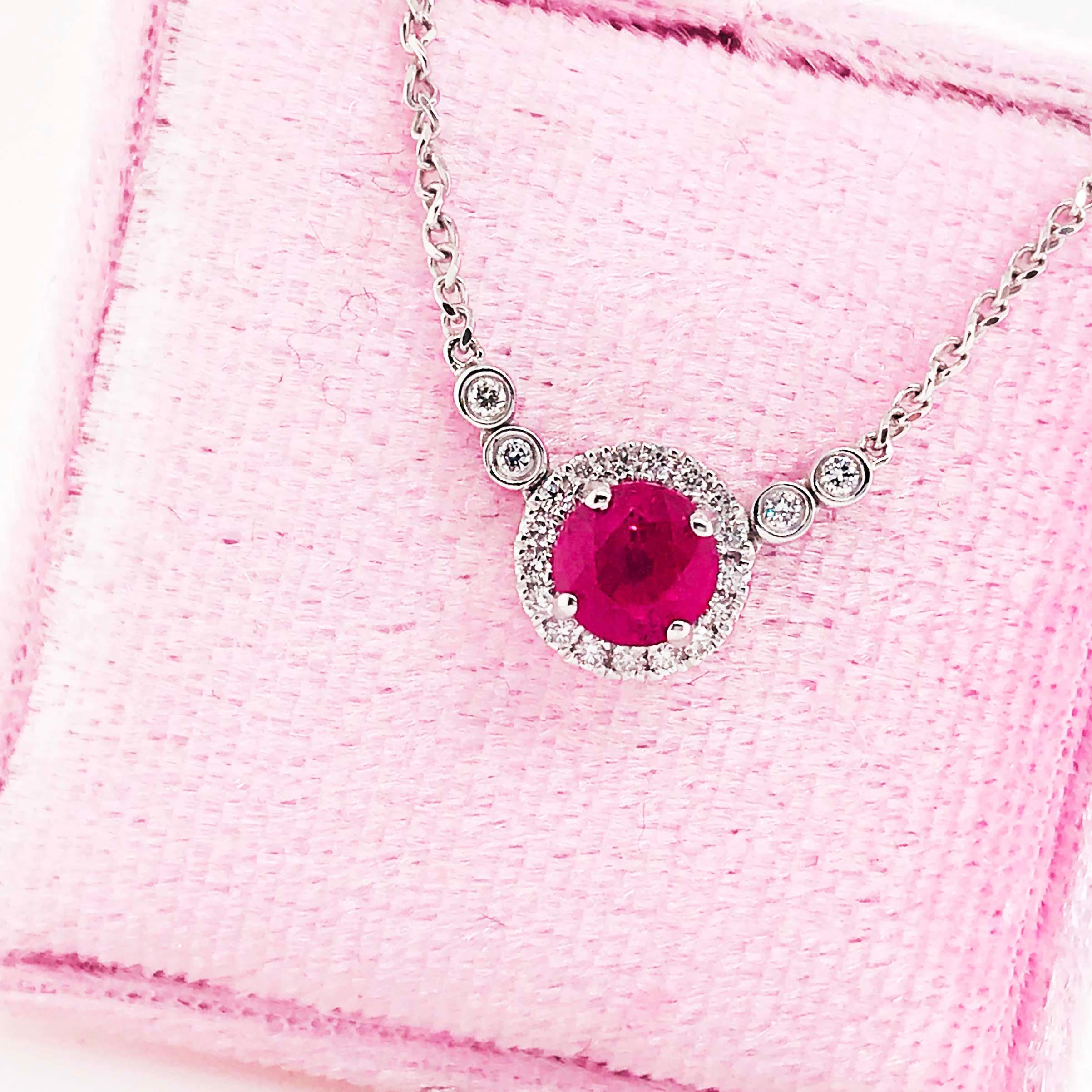 Gorgeous ruby necklace with a genuine, natural diamond halo and genuine, natural ruby gemstone! This stunning necklace has a round, faceted polished ruby that has a bright ruby red color! The precious gemstone is set in a diamond halo with round