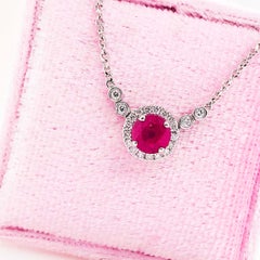 Ruby and Diamond Halo Necklace 18K White Gold 0.76 ct Ruby 0.14 carats Diamonds