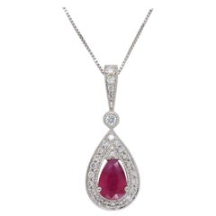 Ruby and Diamond Halo Pendant Necklace Ruby and Diamond Halo Pendant Necklace