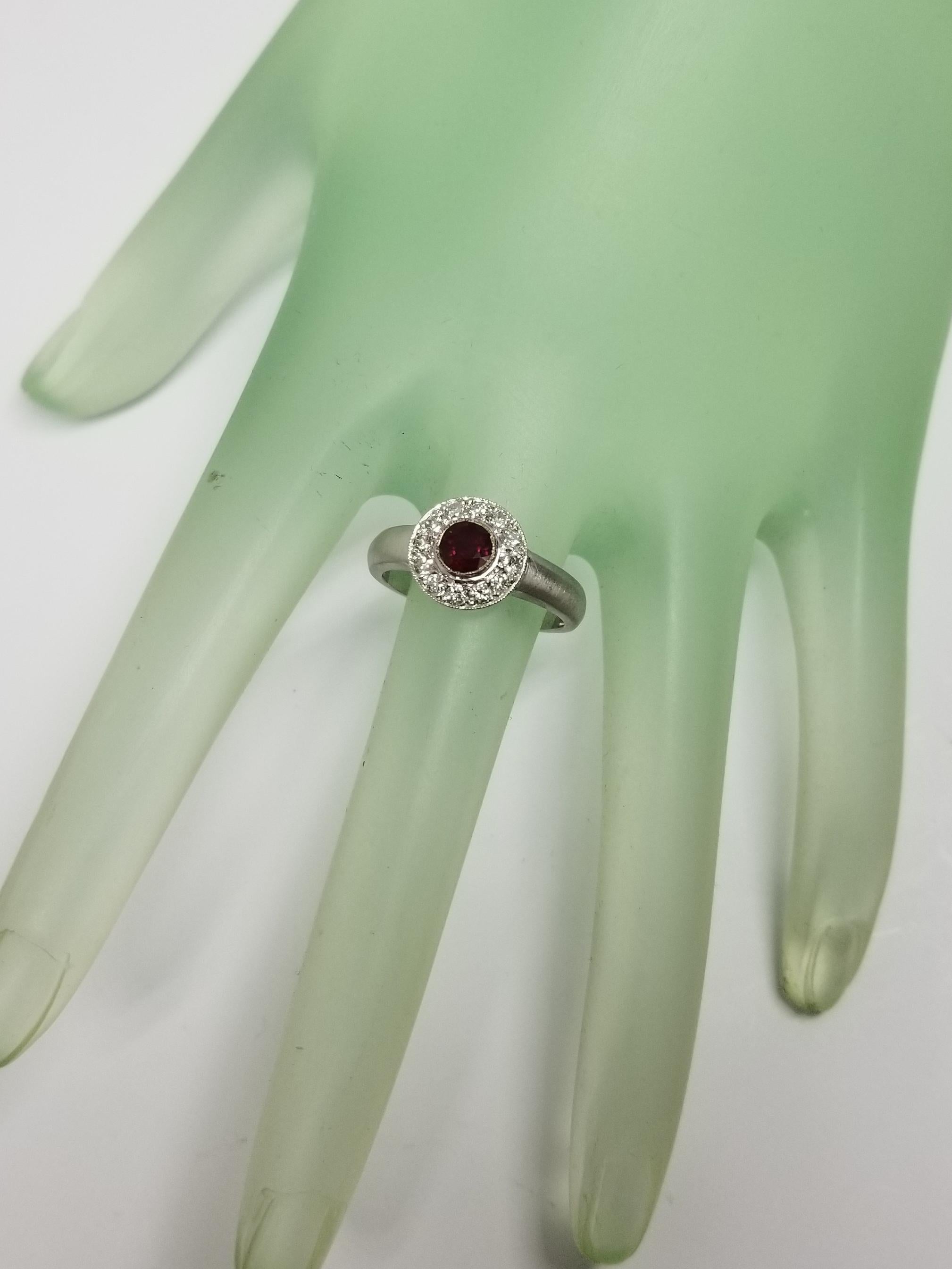 Women's Ruby and Diamond Halo Ring For Sale