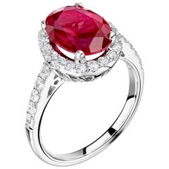 Ruby and Diamond Halo Ring in Platinum