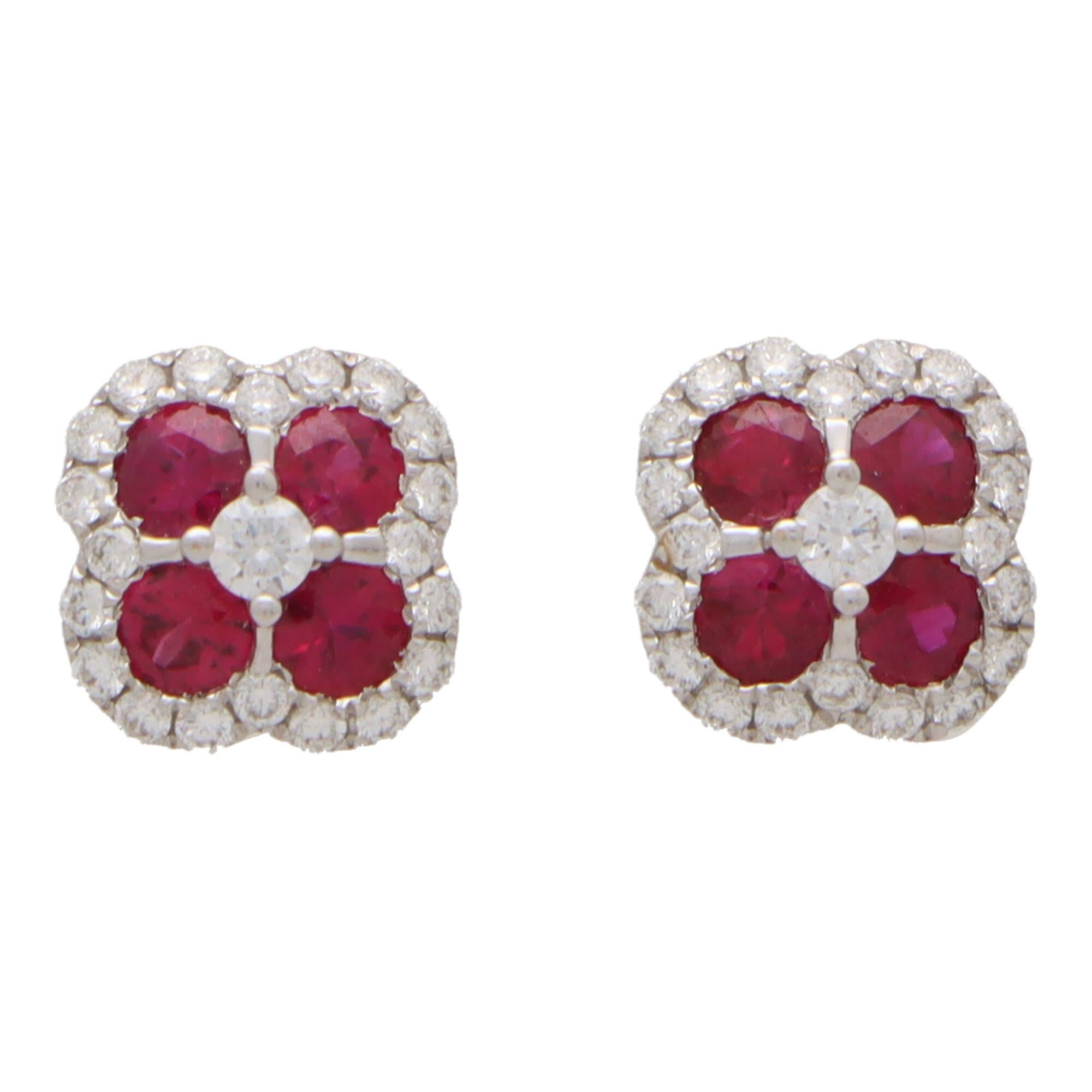 Round Cut Ruby and Diamond Haloed Floral Cluster Earrings Set in 18k White Gold For Sale