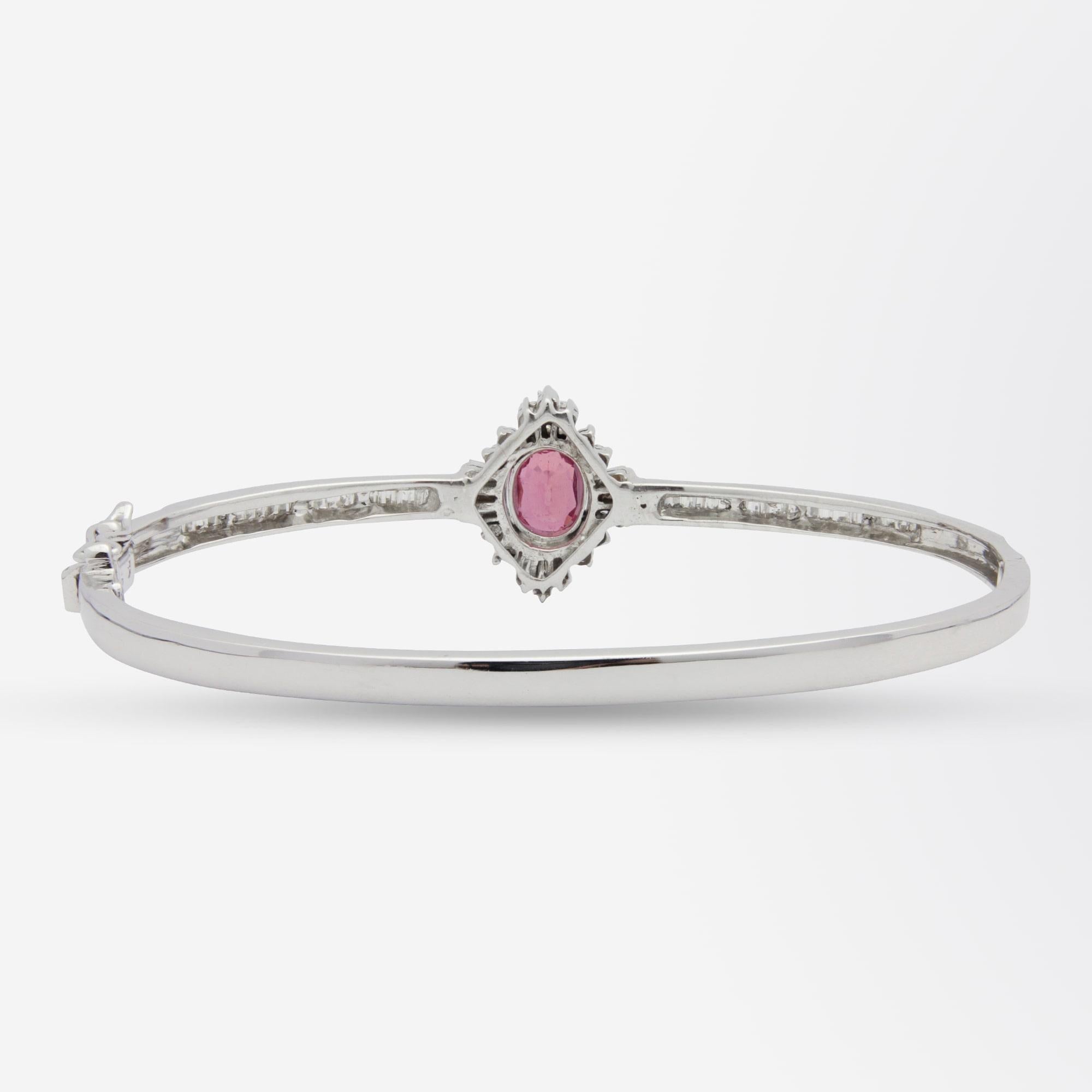 Baguette Cut Ruby and Diamond Hinged Bangle in 14 Karat White Gold