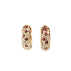 Ruby and diamond hoop earrings in 18k yellow gold