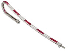Ruby and diamond line bracelet, American, circa 1935.