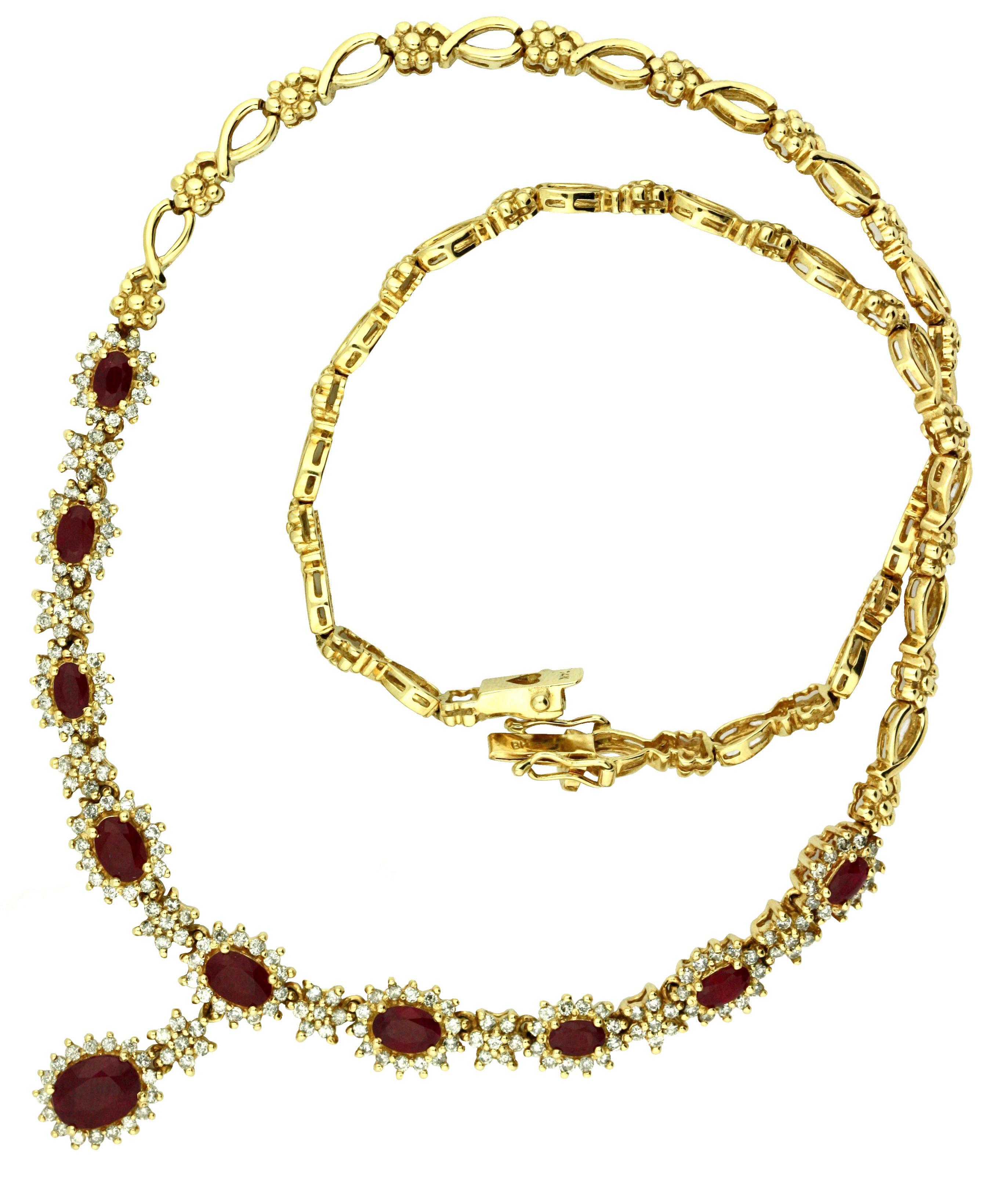 RUBY AND DIAMOND NECKLACE
set with ten oval-shaped rubies together weighing approximately 5.09 carats, highlighted with 187 round full-cut diamonds weighing approximately 4.86 carats, mounted in 14 karat yellow gold, length approximately 16 inches