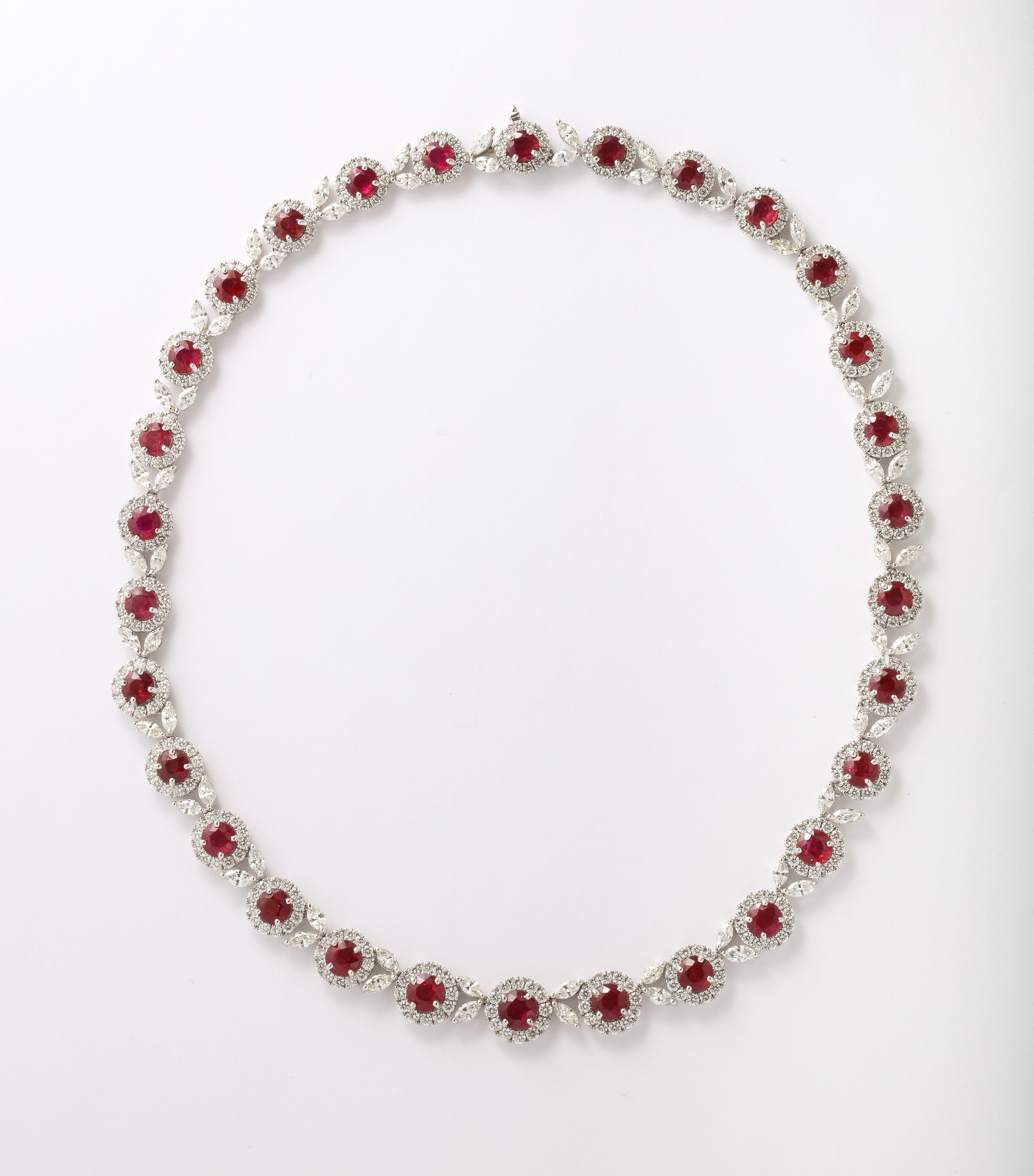 
A FABULOUS and wearable piece! 

Featuring 24.27 carats of Fine round Ruby with remarkable color. 

16.23 carats of white round and marquise diamonds. 

Set in 18k white gold 

16 inch length. 

Certified by Christian Dunaigre of Switzerland. The