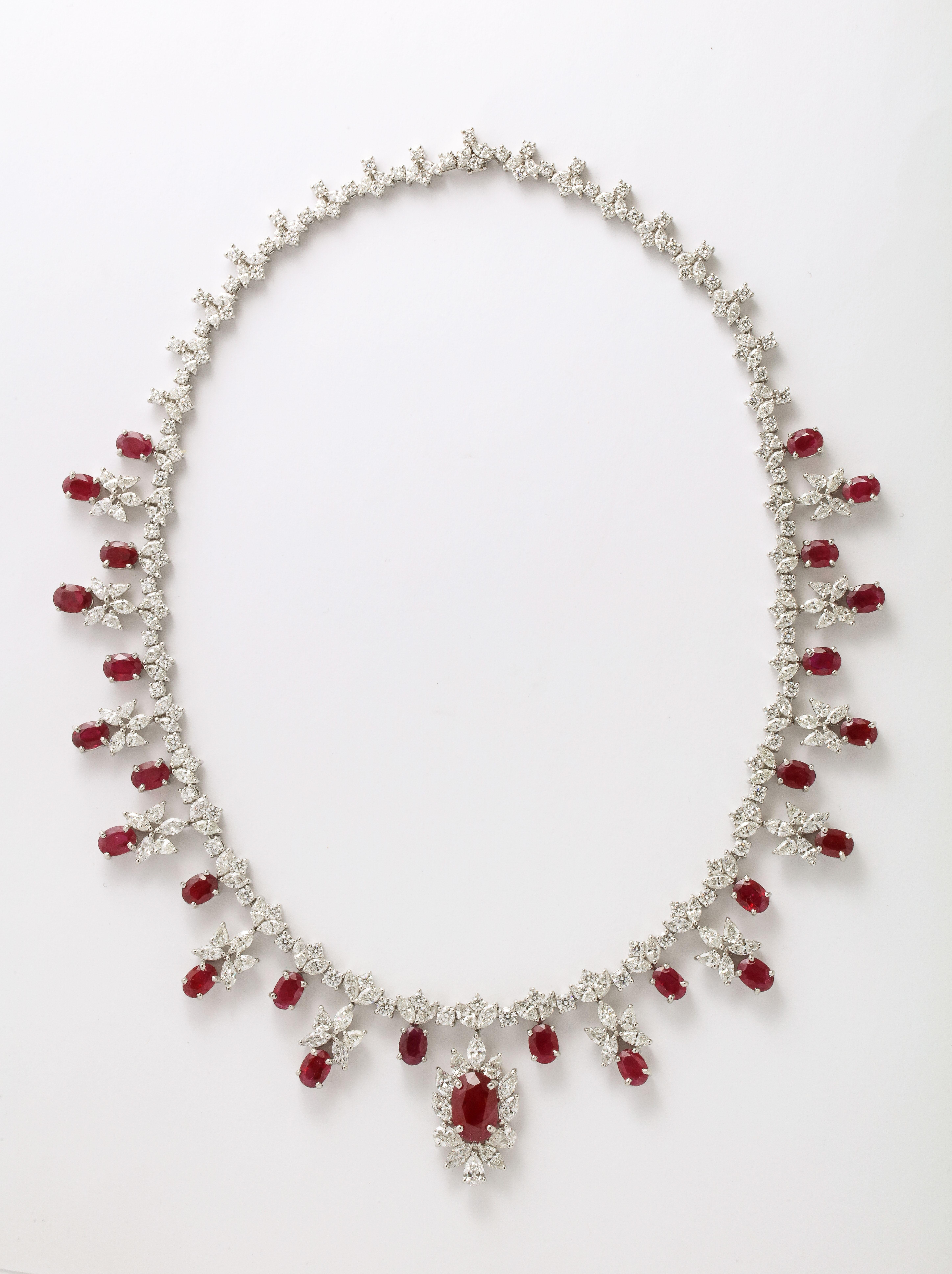 
An exceptional piece! 

34.83 carats of Fine Burma Ruby 

29.30 carats of white round, pear and marquise cut diamonds. 

Set in platinum 

17 inch length 

Certified by Christian Dunaigre of Switzerland. The certificate is available on request for