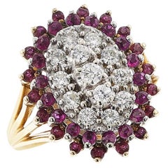 Bague ovale à rubis et diamants, 14k